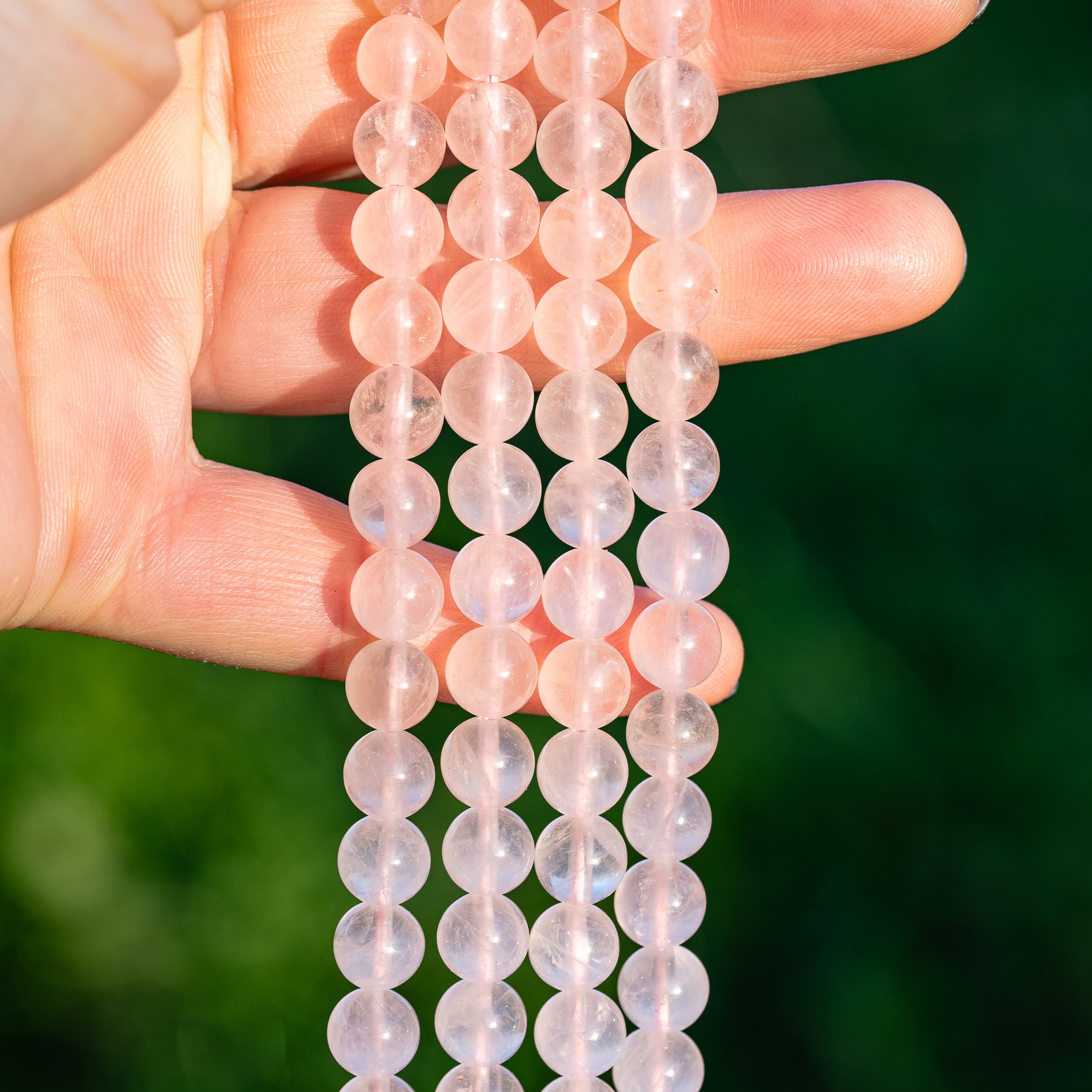 Perles rondes lisses de Quartz rose clair de 8 mm ( rang de env 48 perles )