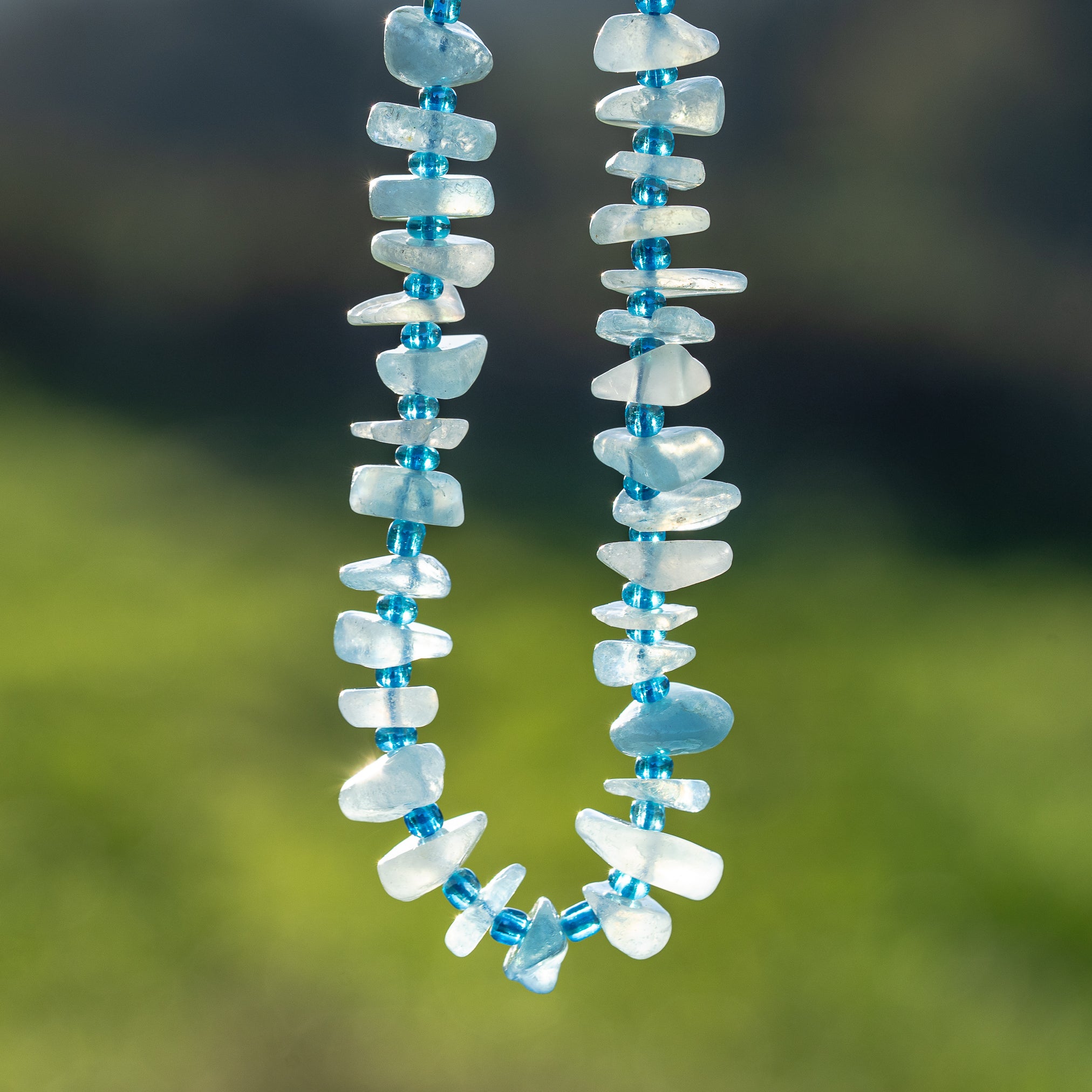 Perles pépites en Aigue-marine de env 10 mm ( rang de env 68 perles )