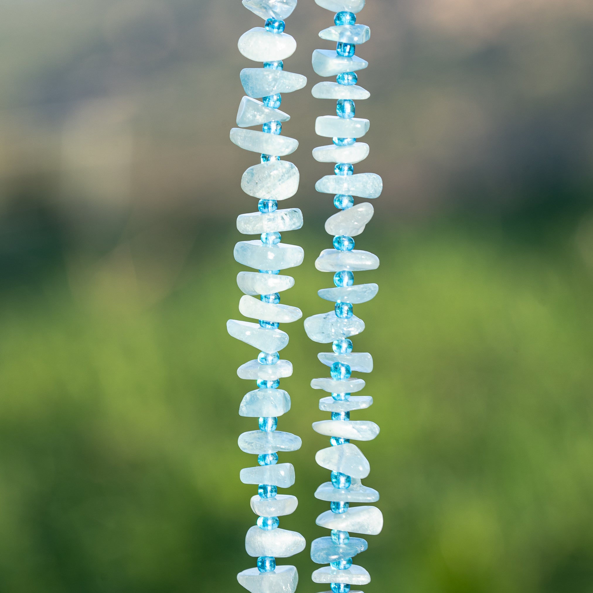 Perles pépites en Aigue-marine de env 10 mm ( rang de env 68 perles )