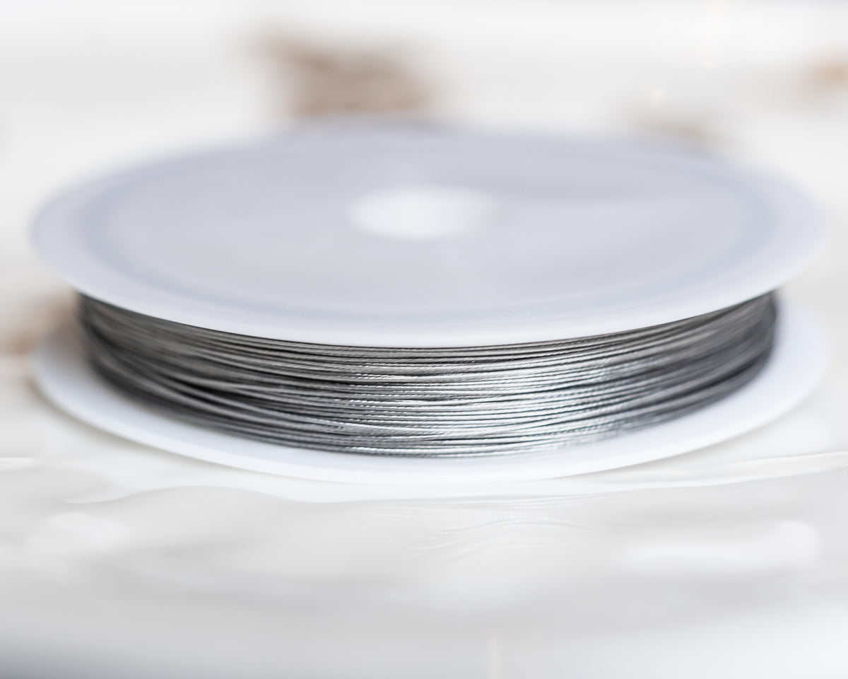 Fil câblé en acier inoxydable argenté de 0,38 mm ( bobine de 60 mètres )