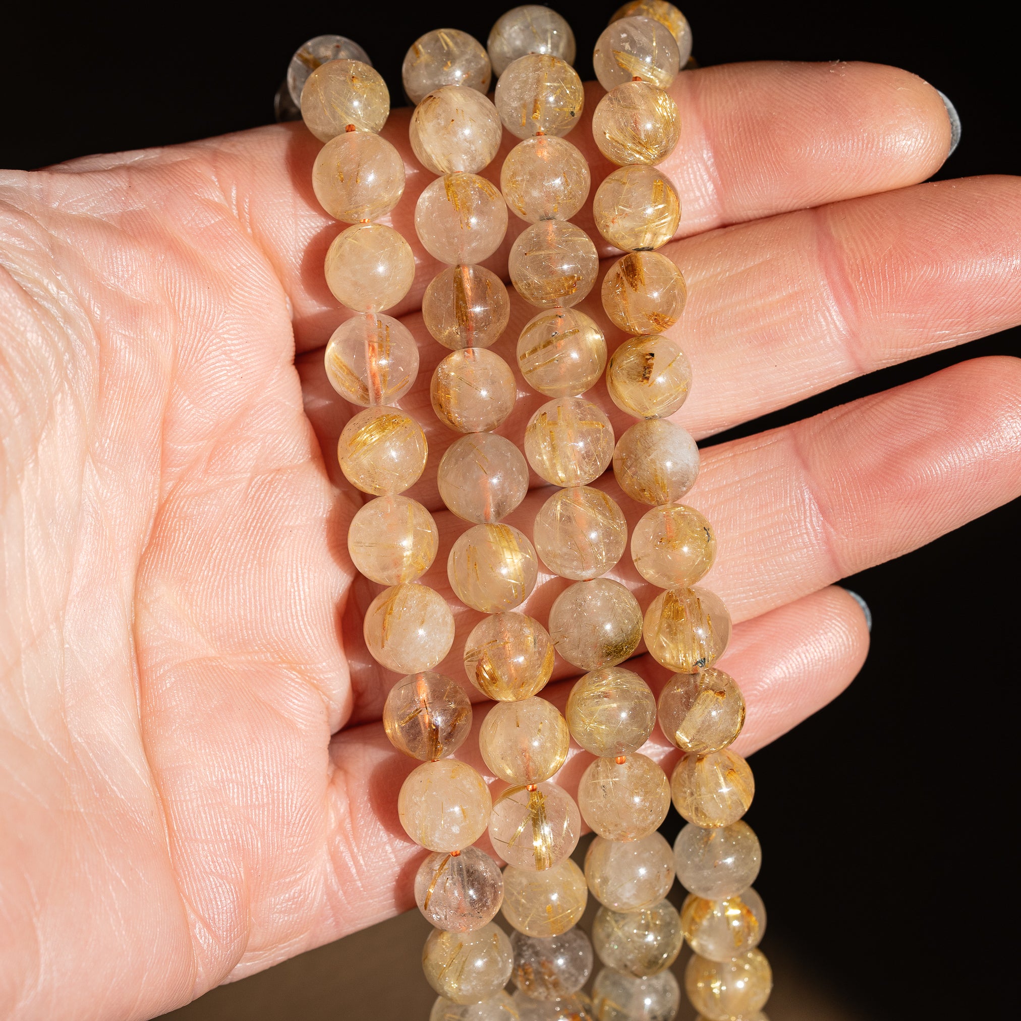 Perles rondes lisses de Quartz Rutile doré de 8,7 mm ( 1/4 de rang de env 11 perles )