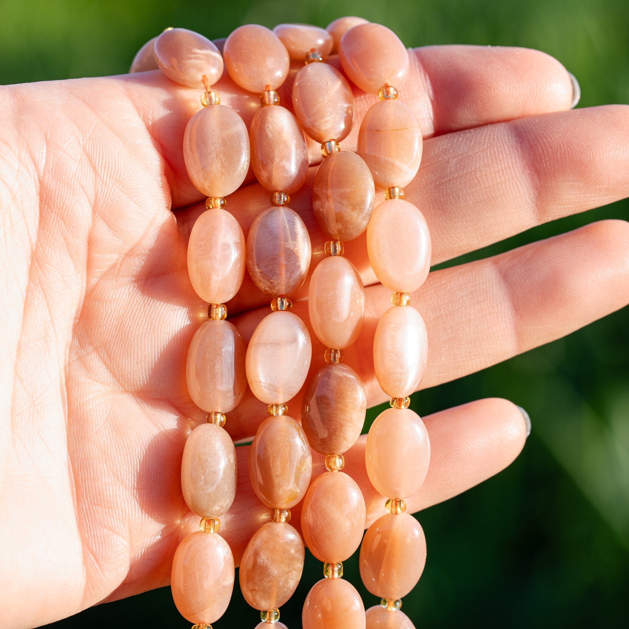 Perles ovales lisses de Pierre de lune rose de env 14 mm ( à l&