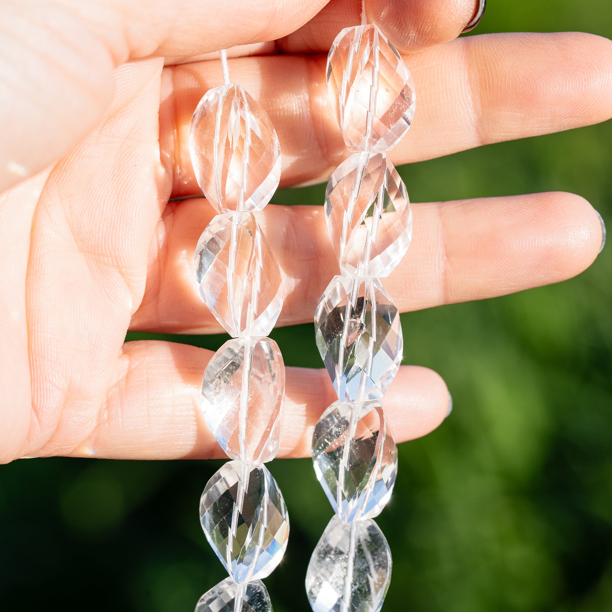 Perles torsadées facettes en cristal de roche clair de env 16/19 mm ( à l&