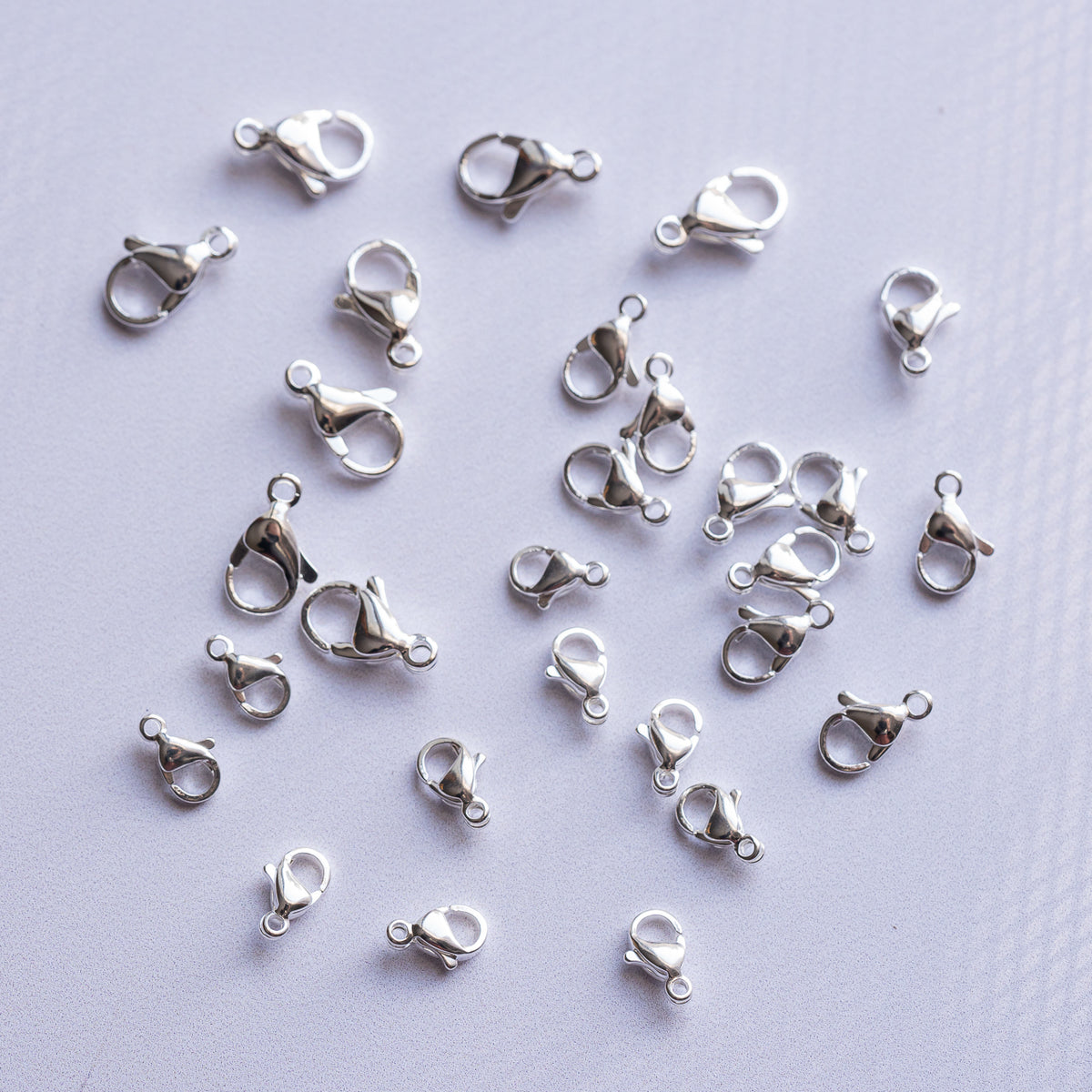 Fermoirs mousqueton en inox plaqué argent 925 de 9 à 13 mm au choix ( à l&