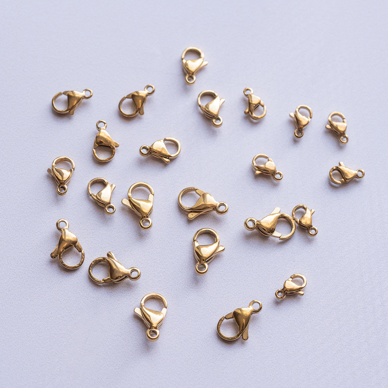 Fermoirs mousqueton en inox plaqué or 18k de 9 à 13 mm au choix ( à l&