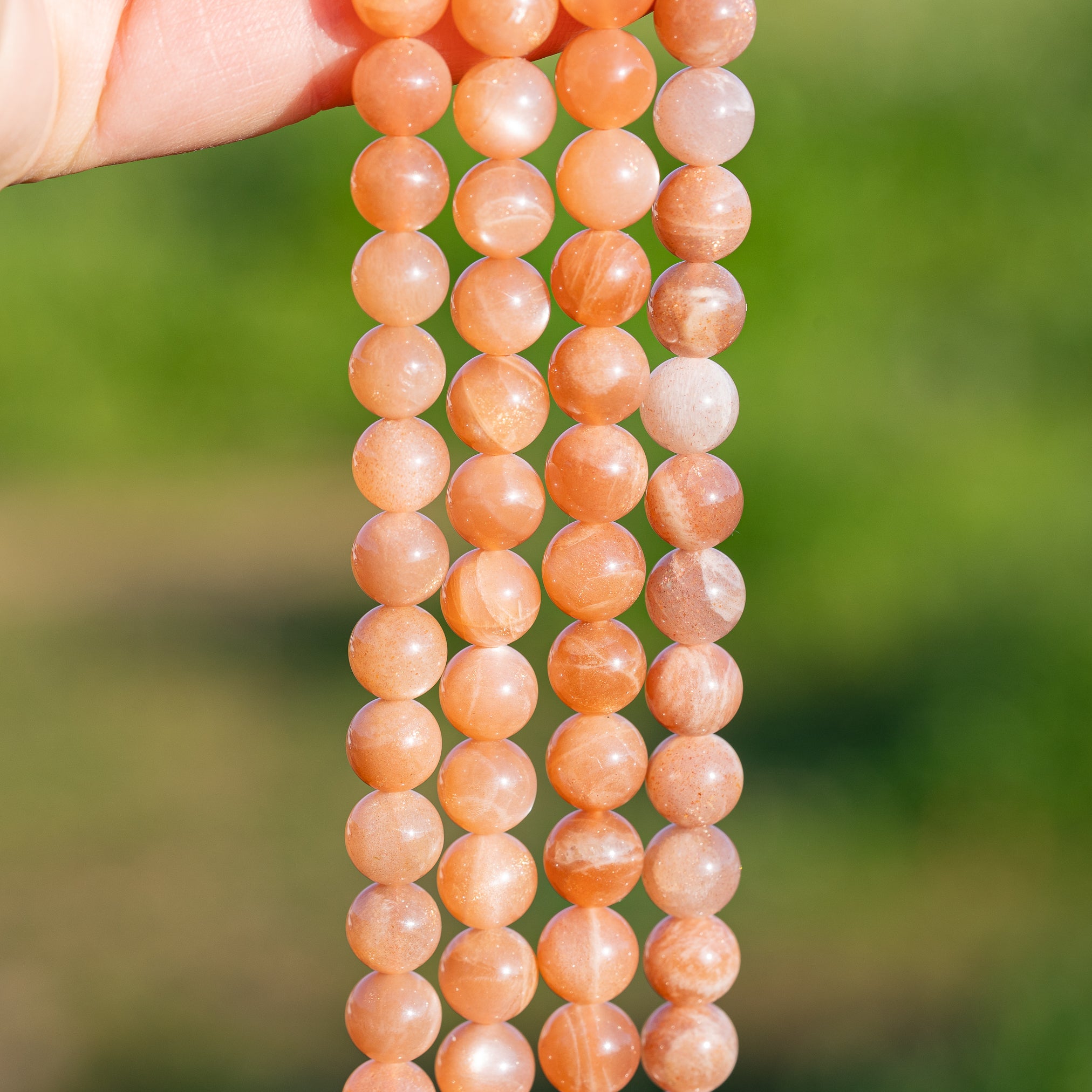 Perles rondes lisses de Pierre de soleil de 6/8 mm ( par rang ou 1/2 rang au choix )