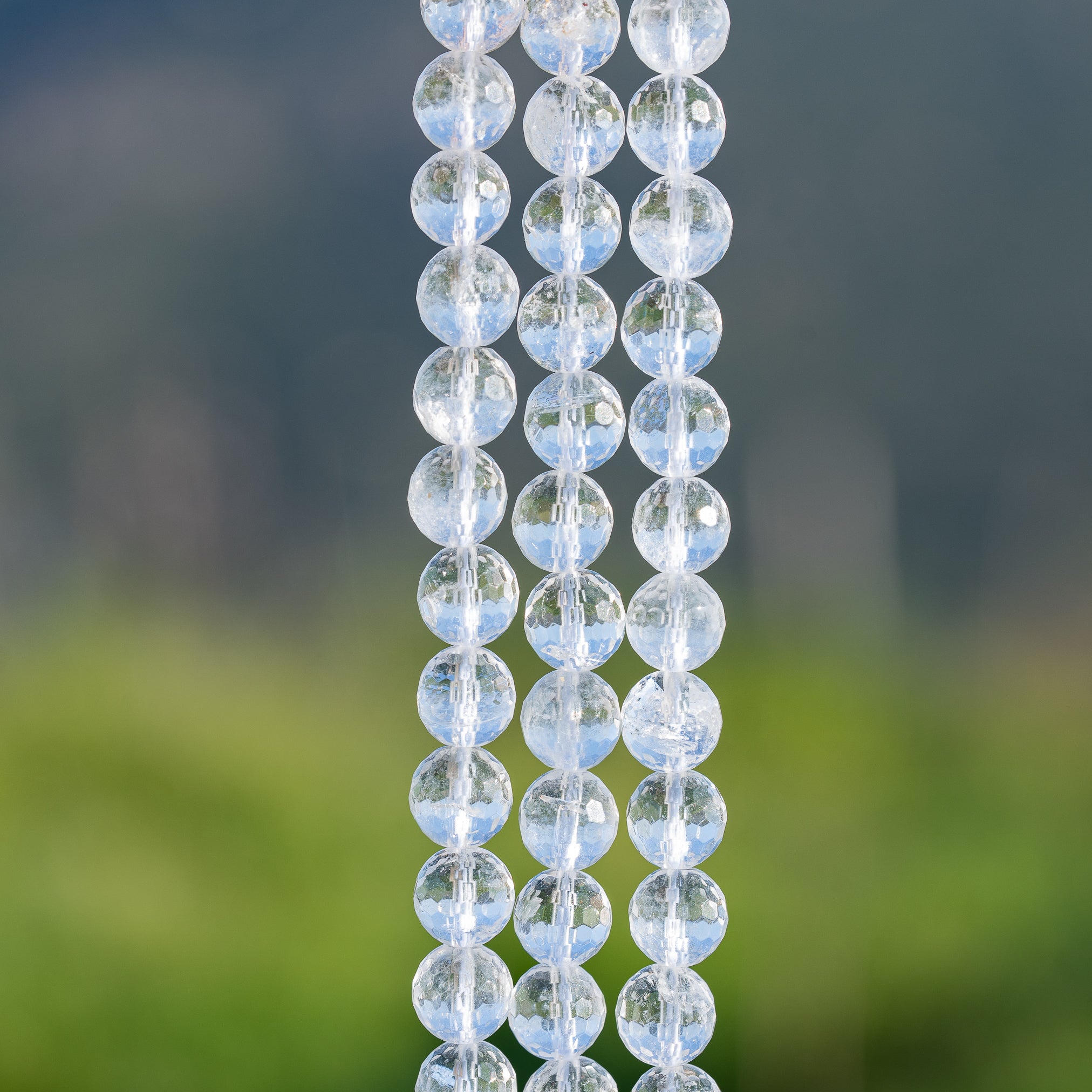 Perles rondes facettes de Cristal de roche de 8,5 mm ( rang de env 45 perles )