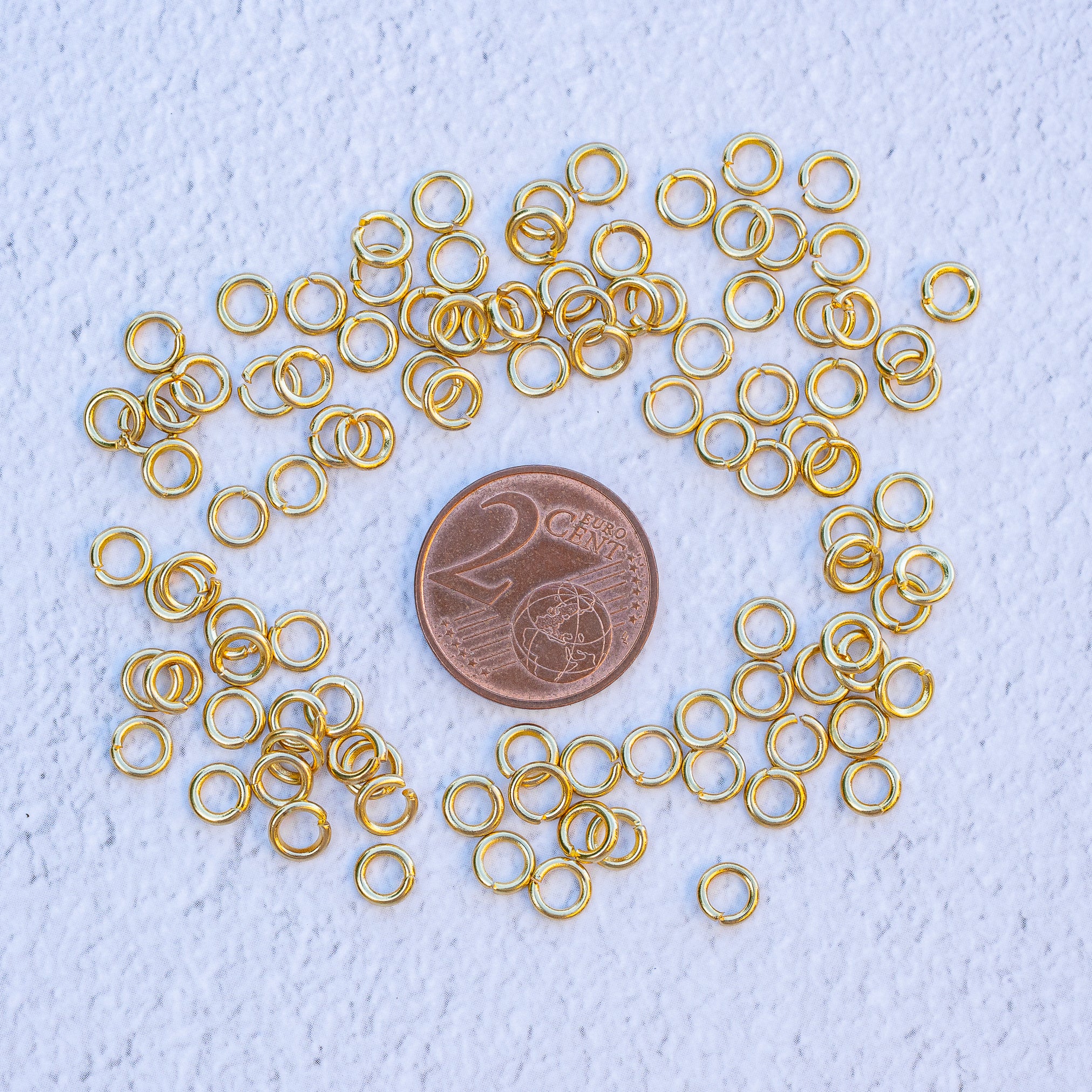 Anneaux de jonction ronds en acier inox plaqué or 24k de 5 x 1 mm ( lot de 10 )