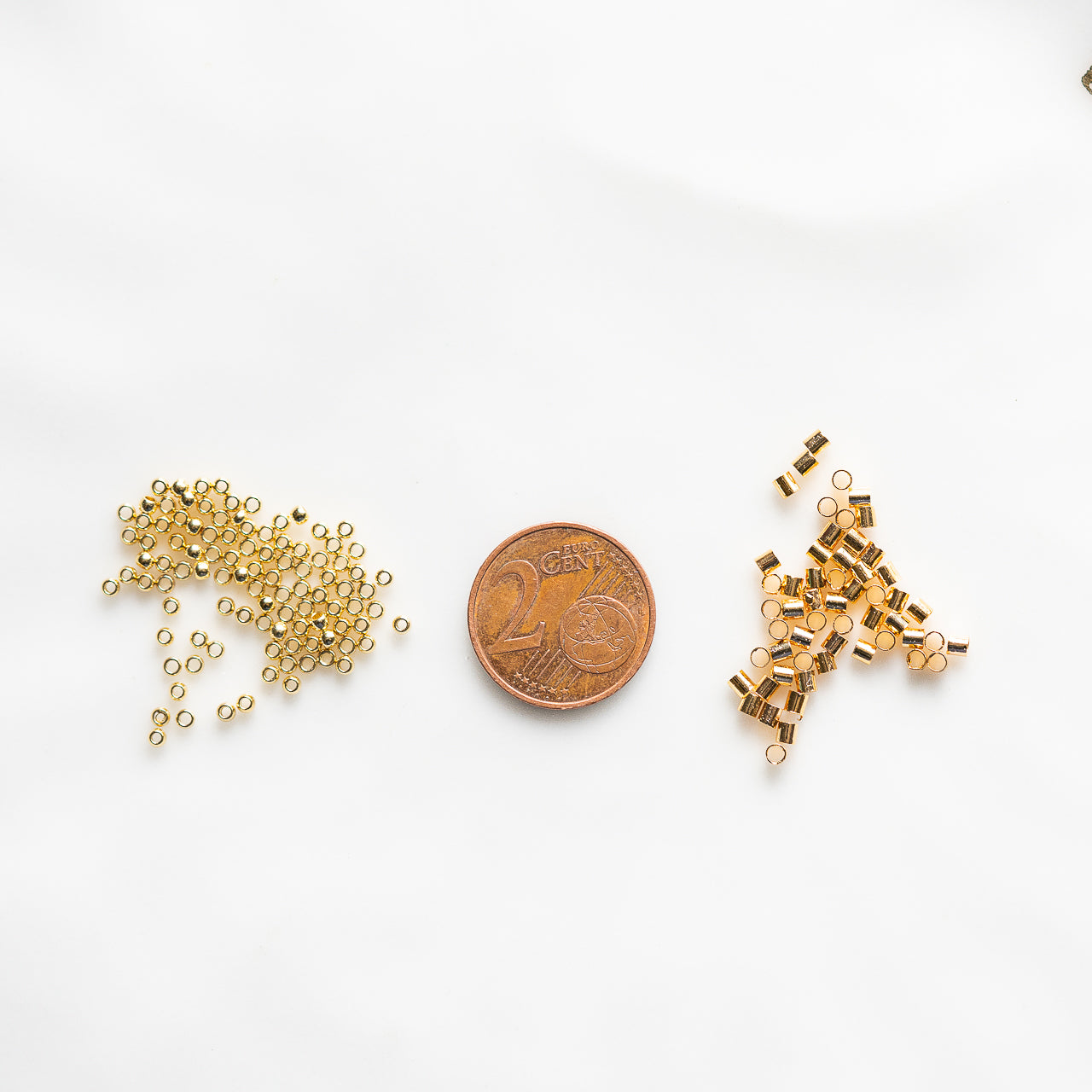 Perles à écraser/sertir en inox ou laiton plaqué or au choix ( lot de 10 )