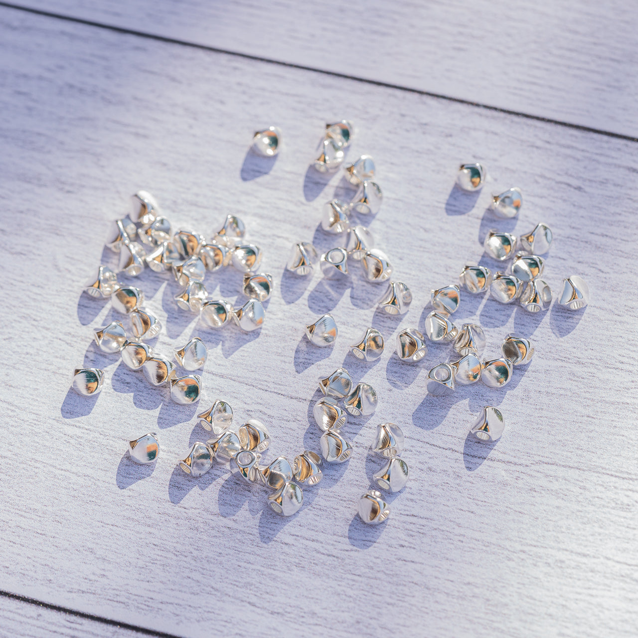 Perles " twistées " en laiton plaqué argent 925 de 4,5 mm ( lot de 4 )