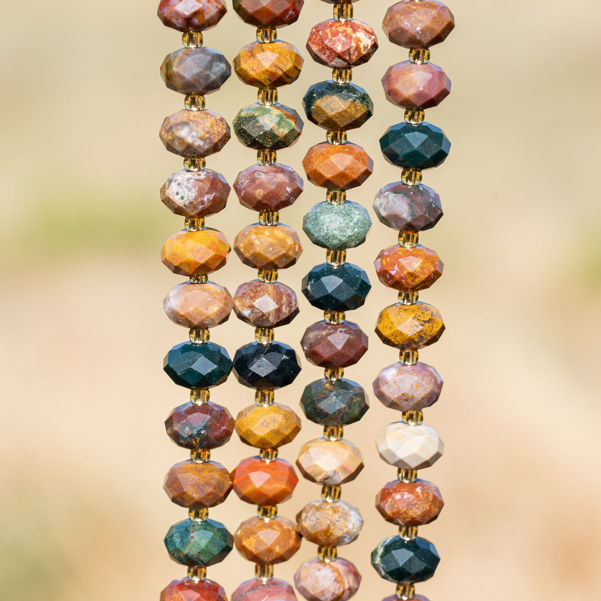 Perles rondelles facettes de Jaspe océan de 10 x 6,5 mm ( 1/2 rang de env 21/22 perles )
