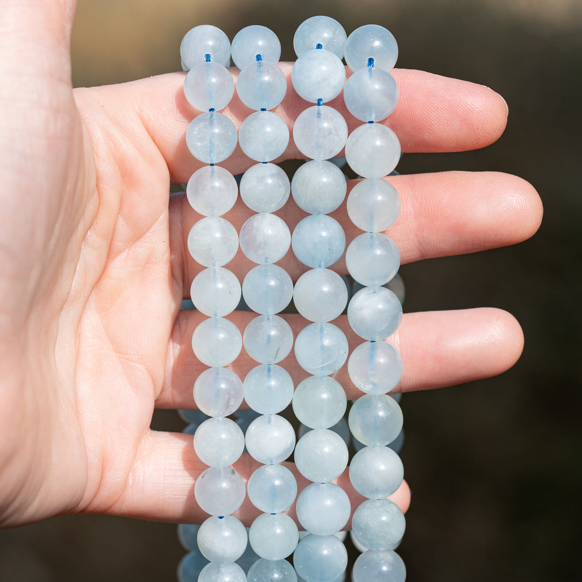Perles rondes lisses en Aigue-marine de 9,5/10,5 mm ( lot de 10 perles )