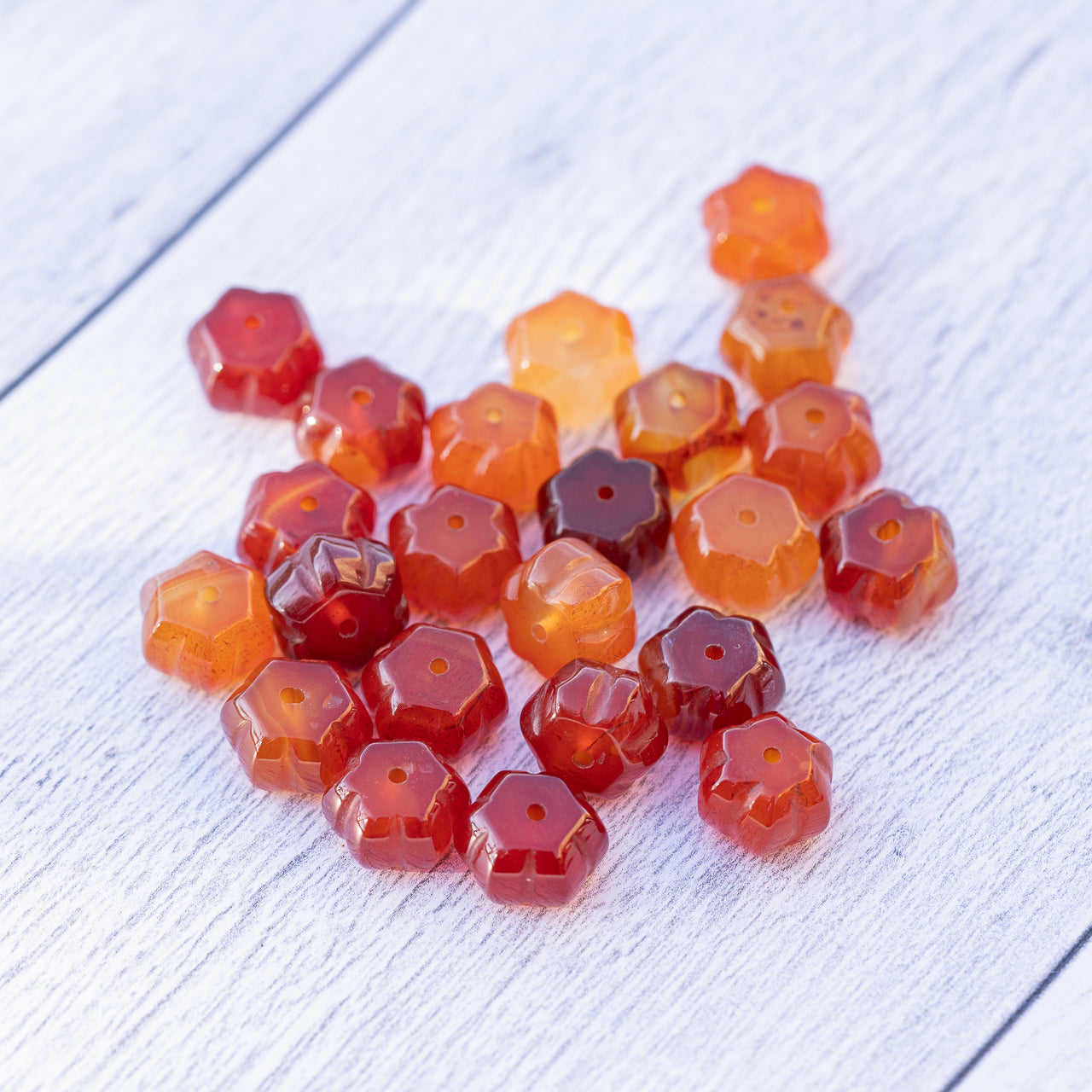 Perles rondelles sculptées " citrouilles " en Cornaline de env 12 x 8 mm ( à l&