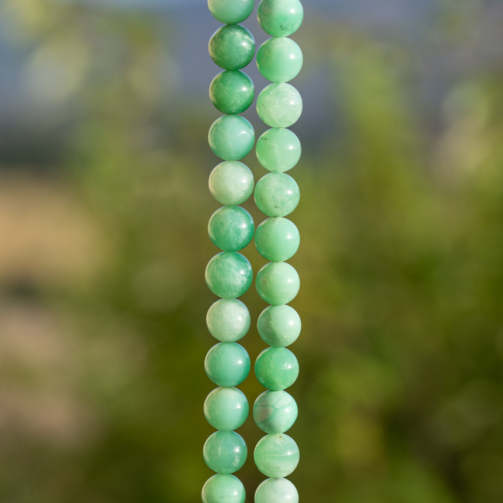 Perles rondes lisses grade A de Chrysoprase de 8 mm ( 1/2 rang de env 24 perles )