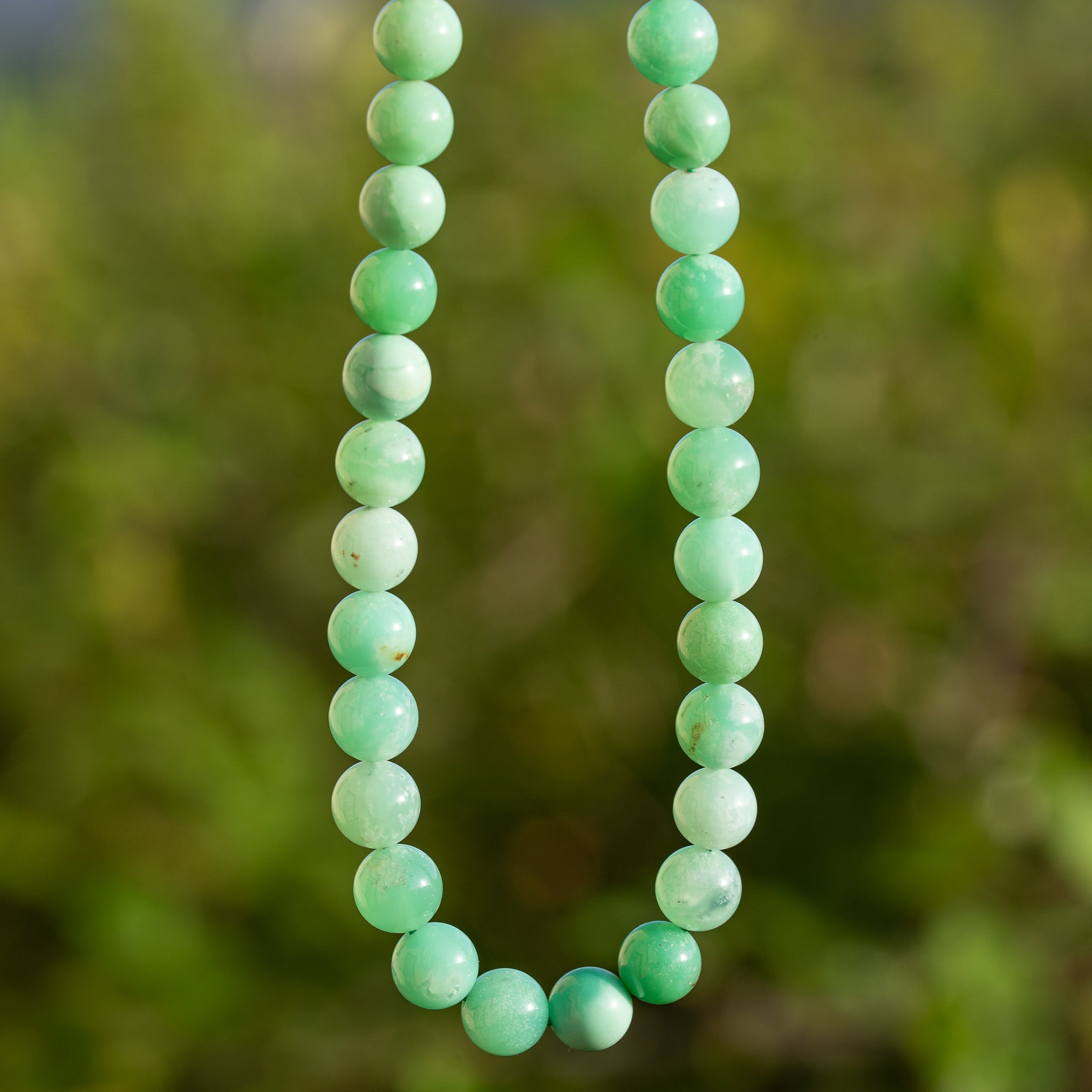 Perles rondes lisses grade A de Chrysoprase de 8 mm ( 1/2 rang de env 24 perles )