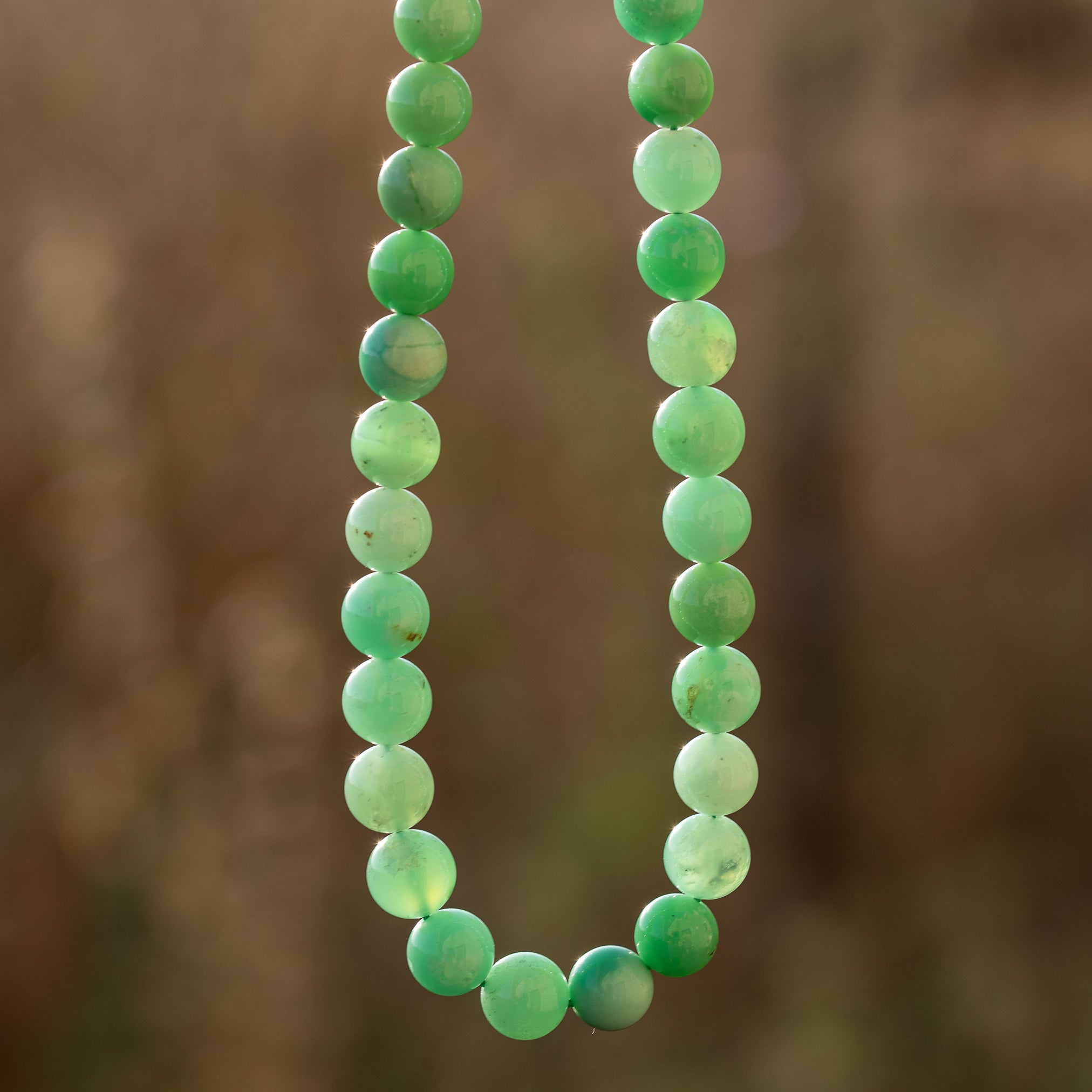Perles rondes lisses grade A de Chrysoprase de 8 mm ( 1/2 rang de env 24 perles )