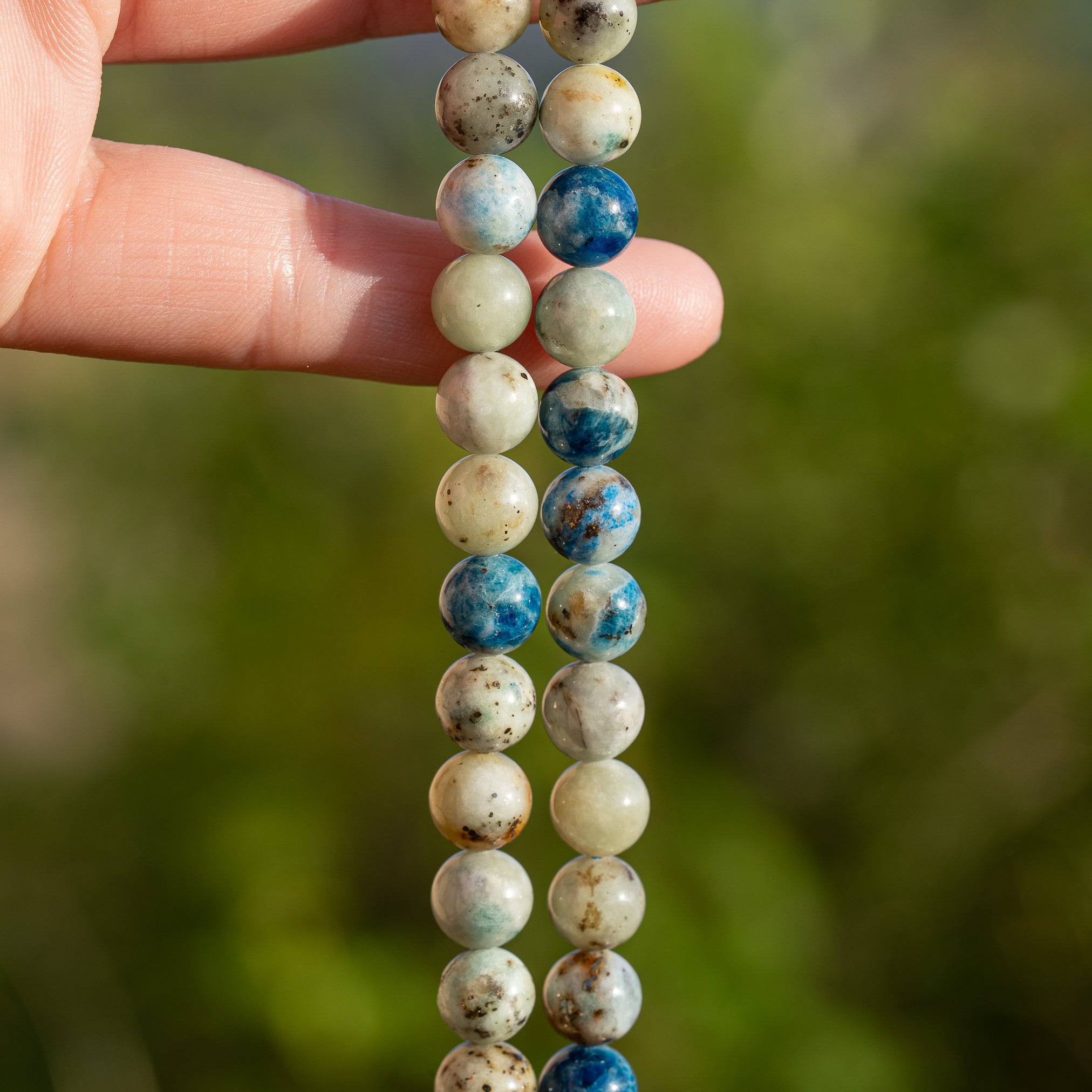 Perles rondes lisses de Calcite à inclusions d&