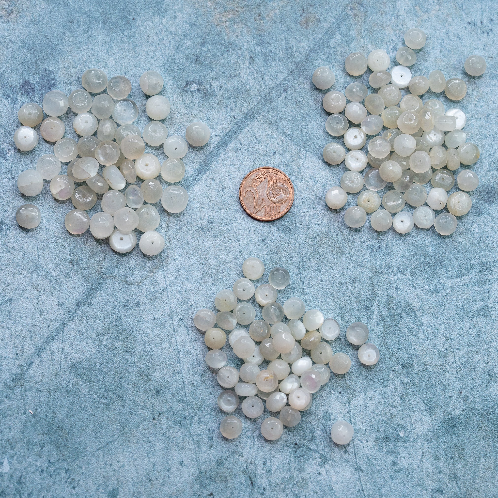 Perles rondelles facettes de Pierre de lune noire de 7/8,5 mm ( lot de 4 perles )