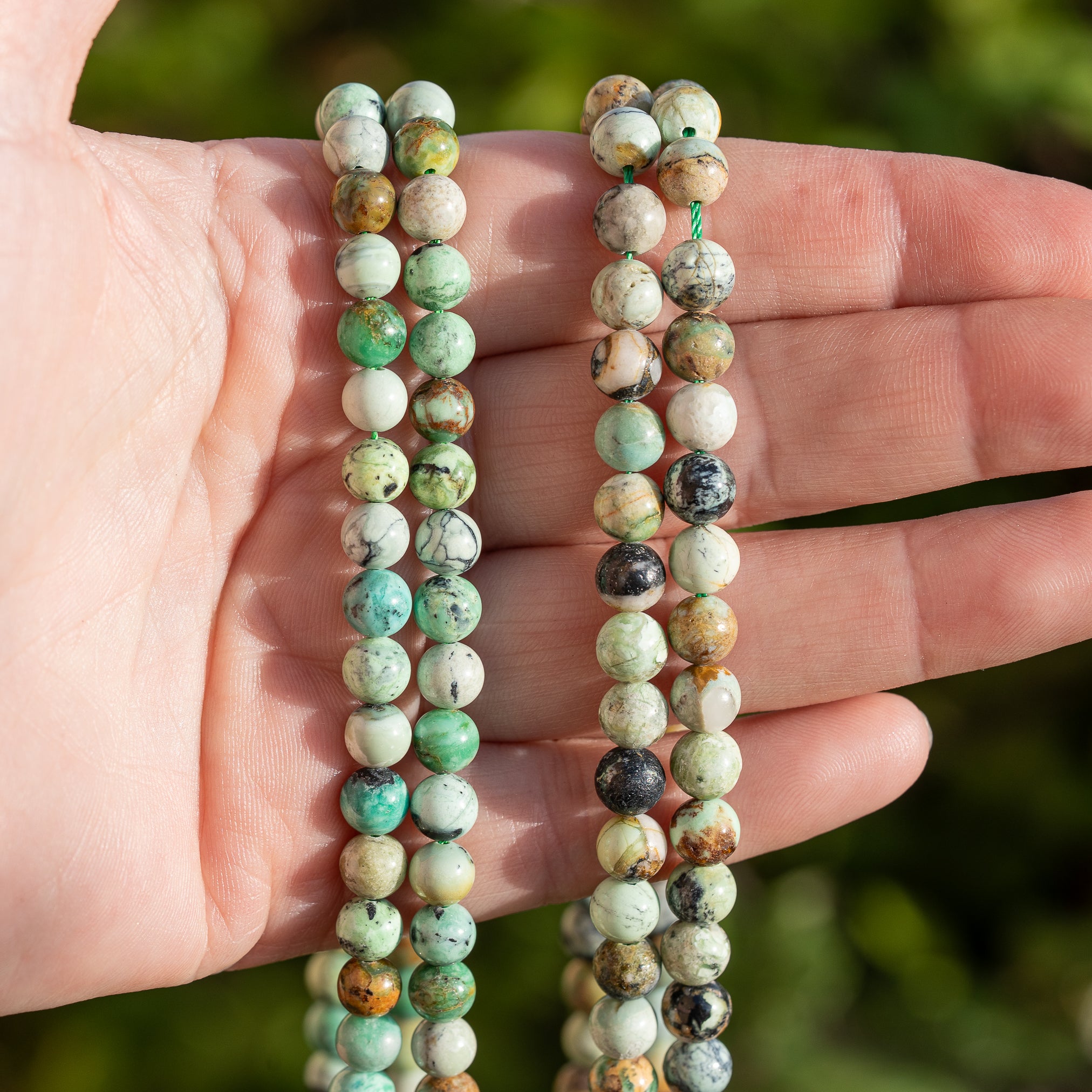 Perles rondes lisses de Variscite de 6 ou 6,5 mm ( 1/2 rang de 32/30 perles )