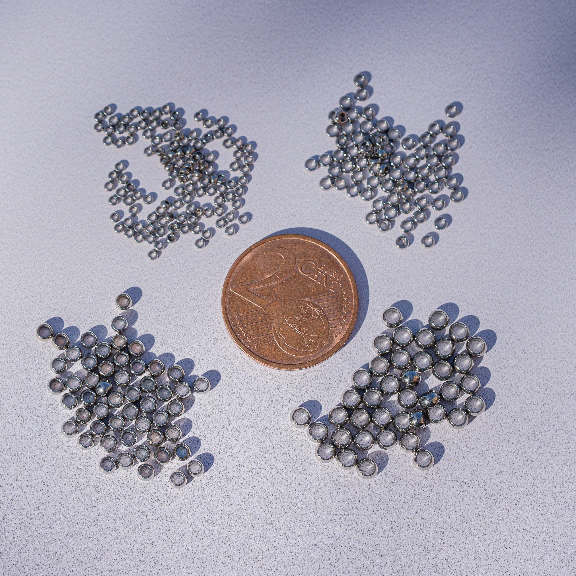 Perles à écraser/sertir en acier inoxydable chirurgical 4 tailles au choix mm ( lot de 4 ou 10 )