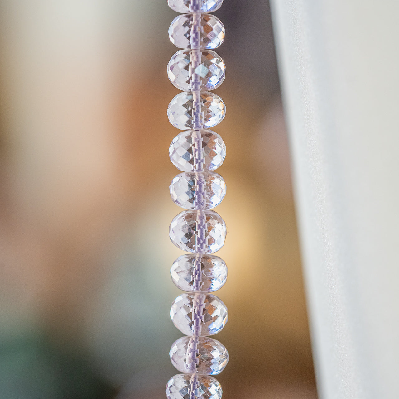 Perles rondelles facettes en Améthyste lilas de 8 à 9 mm au choix ( lot de 2 perles )