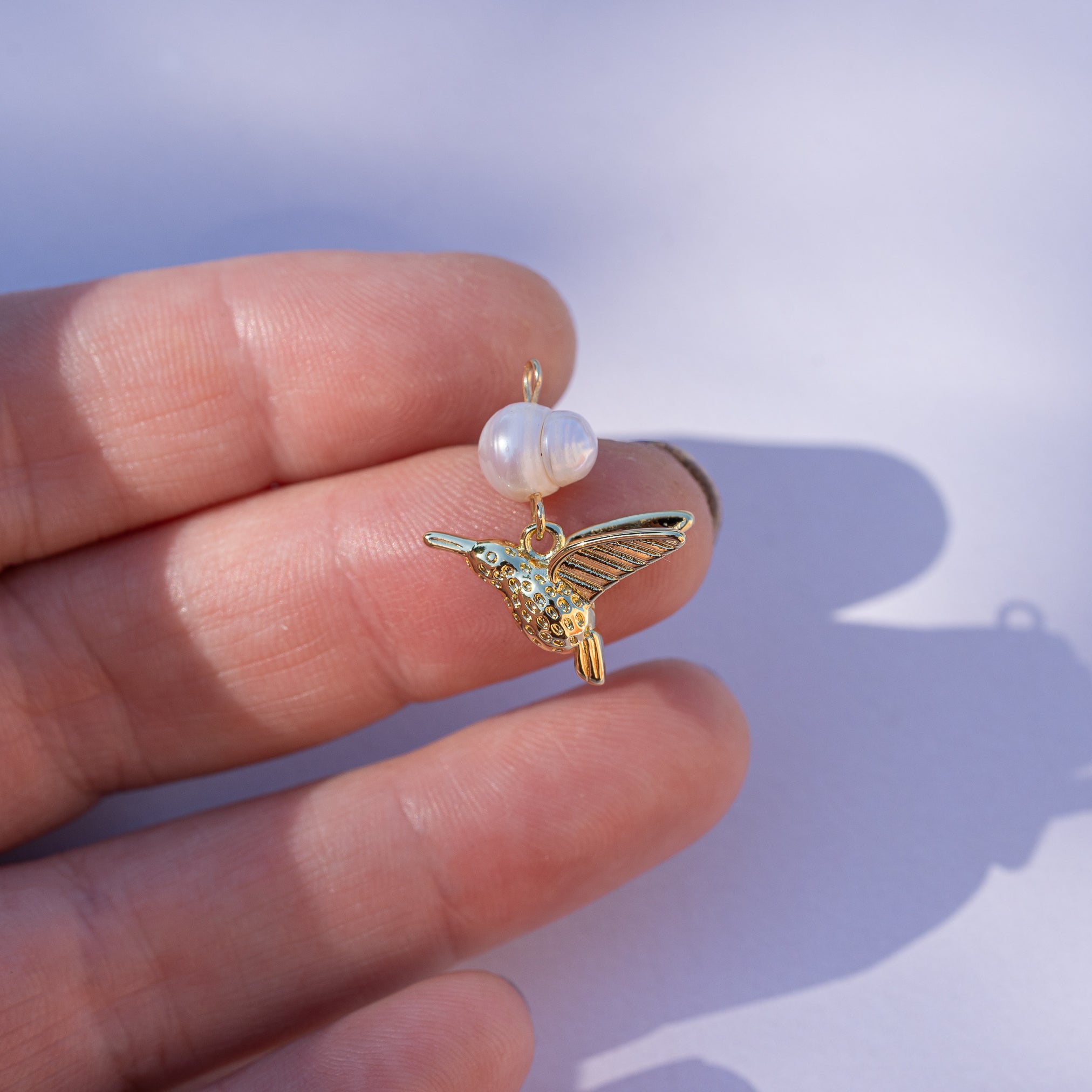 Breloques oiseaux en perle d&