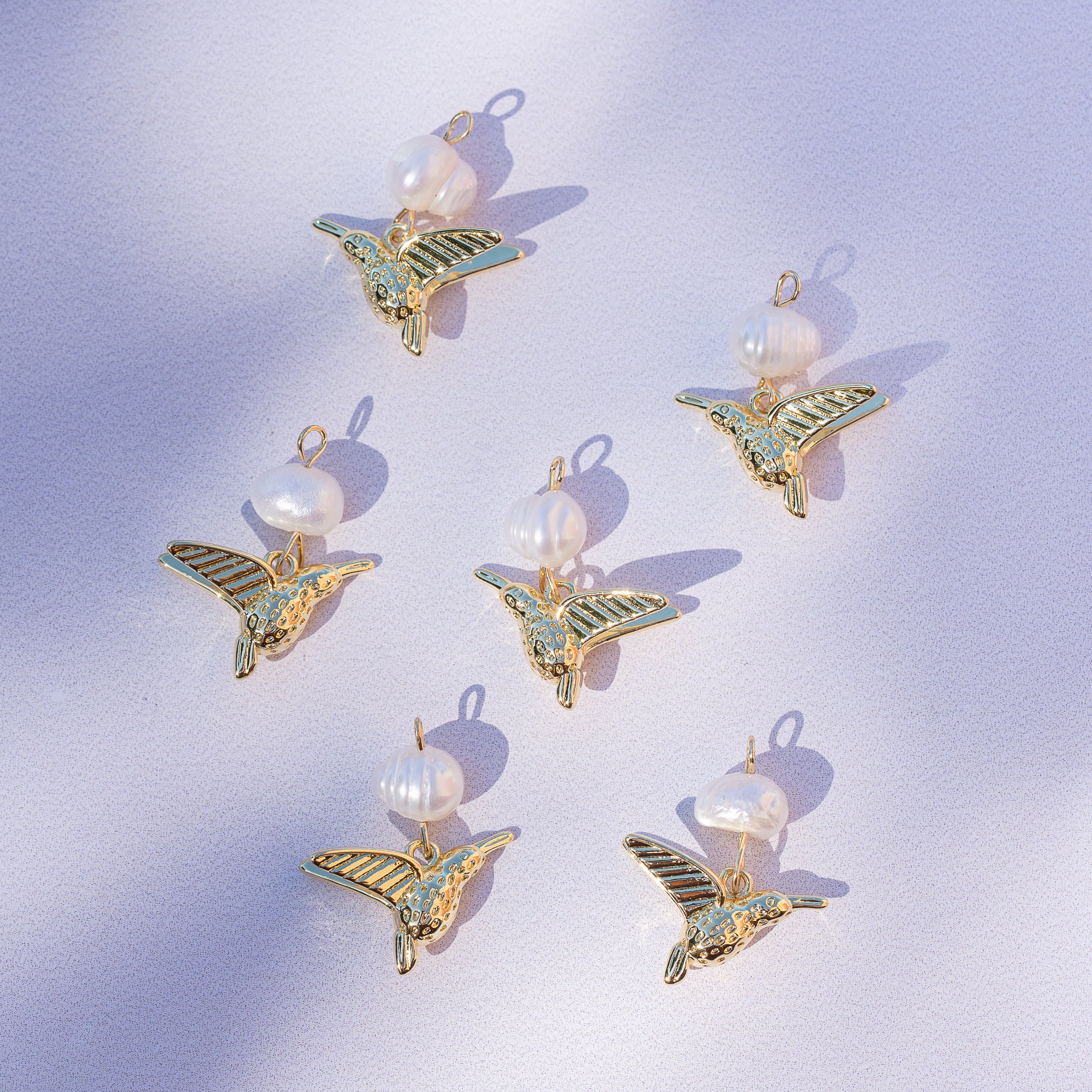 Breloques oiseaux en perle d&