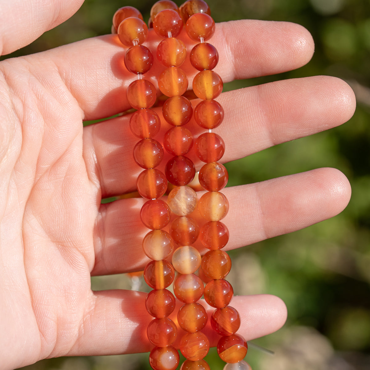 Perles rondes lisses de Cornaline de 8 mm ( rang de env 48 perles )