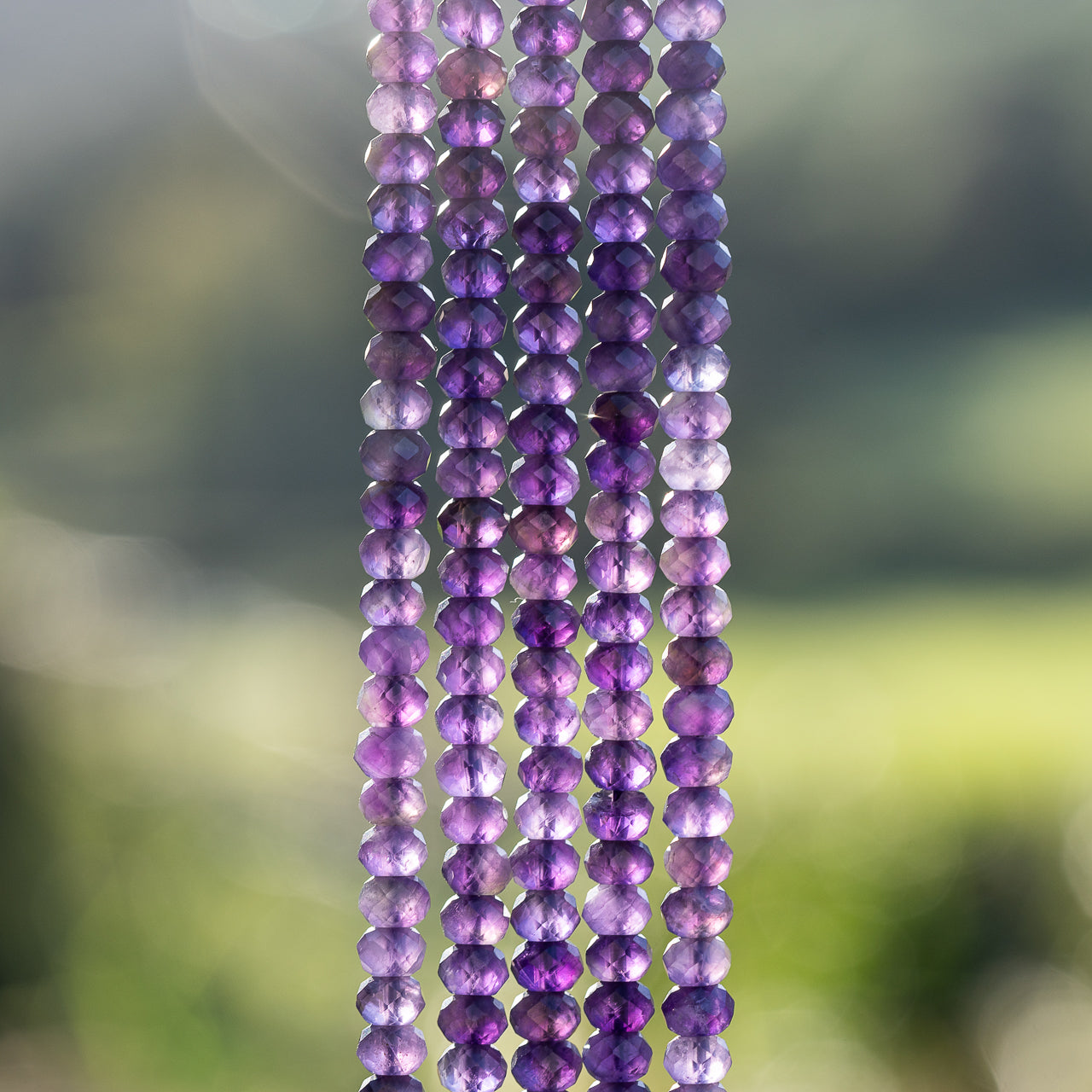 Perles rondelles facettes en Améthyste de 6 x 4 mm ( 1/2 rang de env 44 perles )