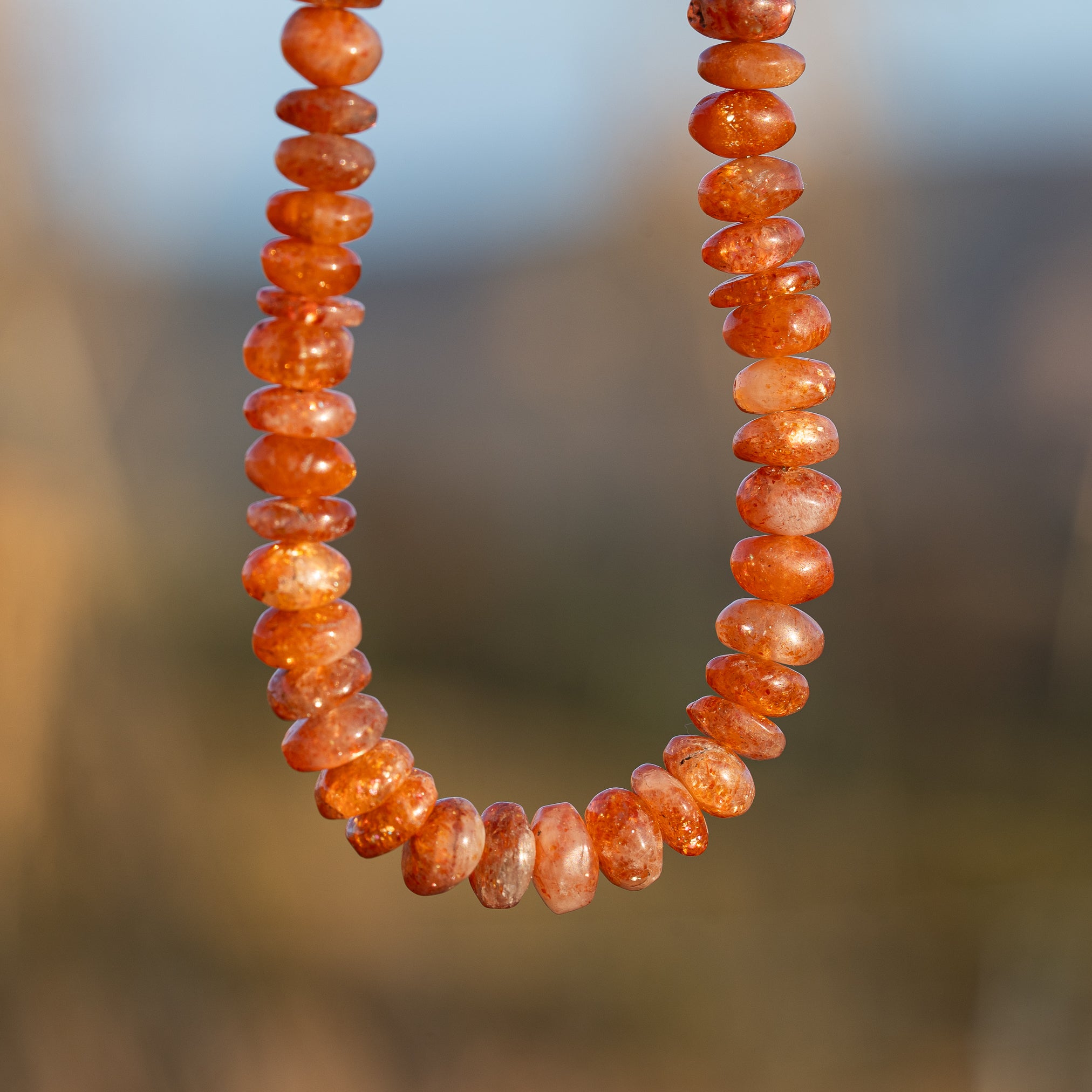 Perles rondelles lisses de Pierre de soleil de 6 à 6,5 mm au choix ( lot de 4 perles )
