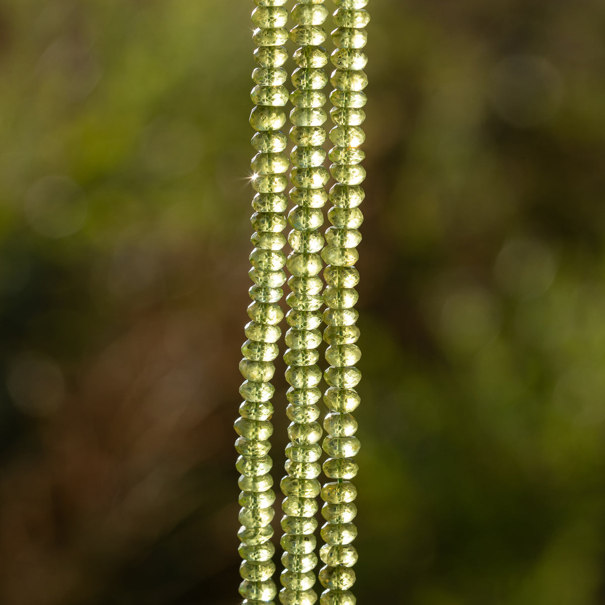 Perles rondelles facettes de Péridot de env 5 mm ( lot de 4 perles )