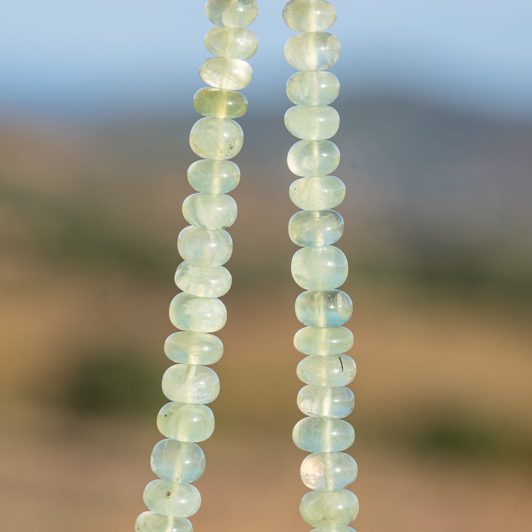 Fils de env 40 cm de perles rondelles lisses de Préhnite en dégradé de 5,5 à 10 mm