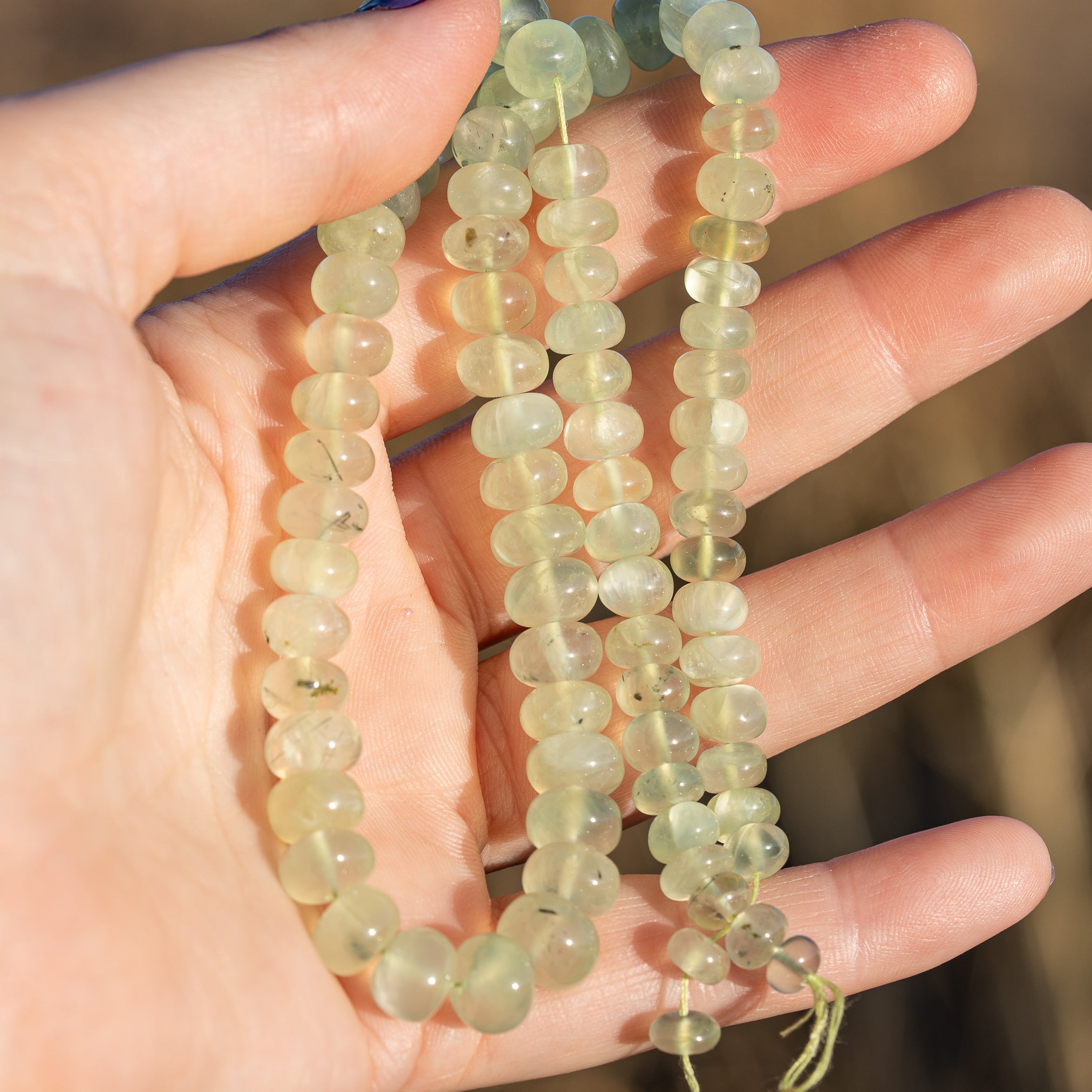 Fils de env 40 cm de perles rondelles lisses de Préhnite en dégradé de 5,5 à 10 mm