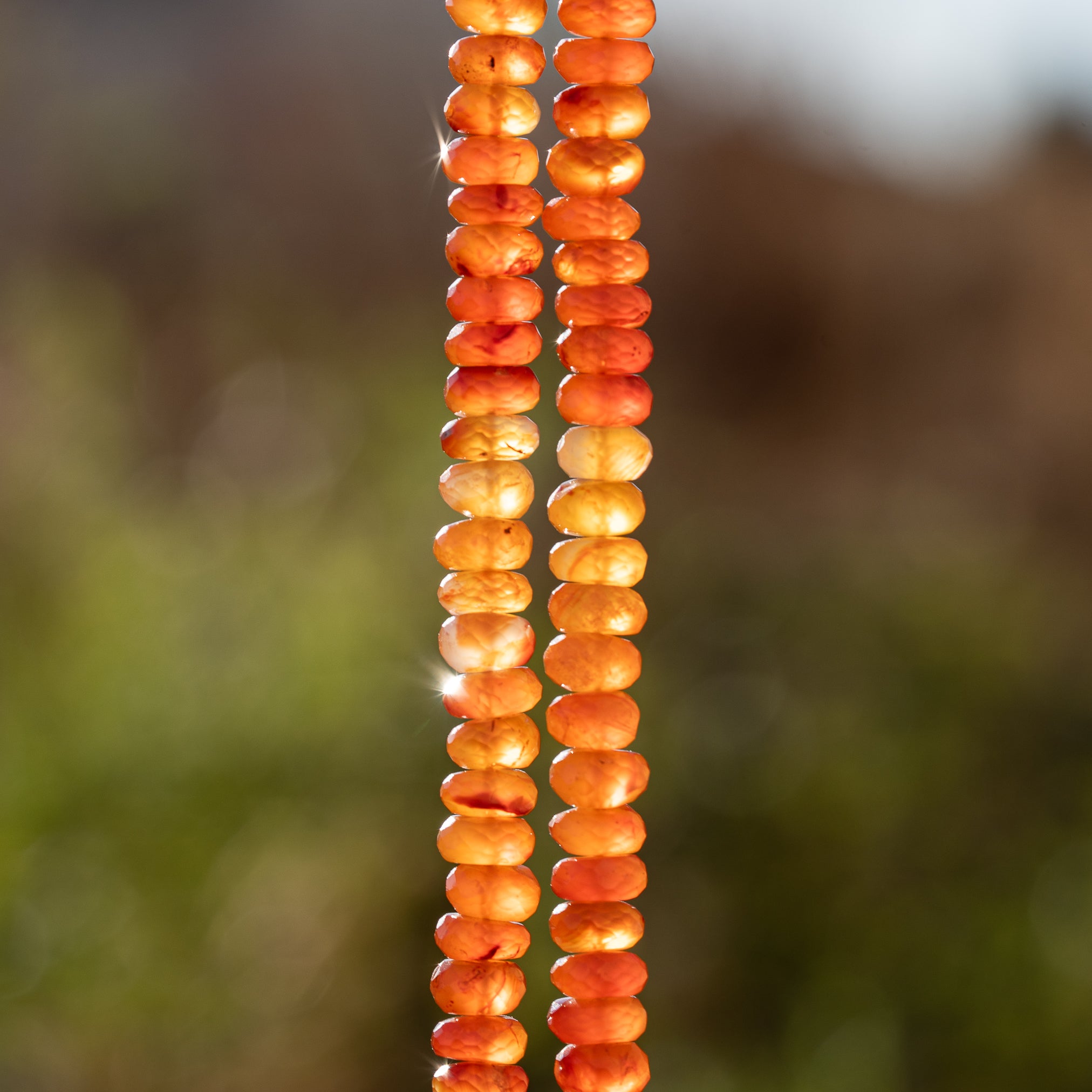 Perles rondelles facettes de Cornaline de env 6,5 mm ( lot de 4 perles )