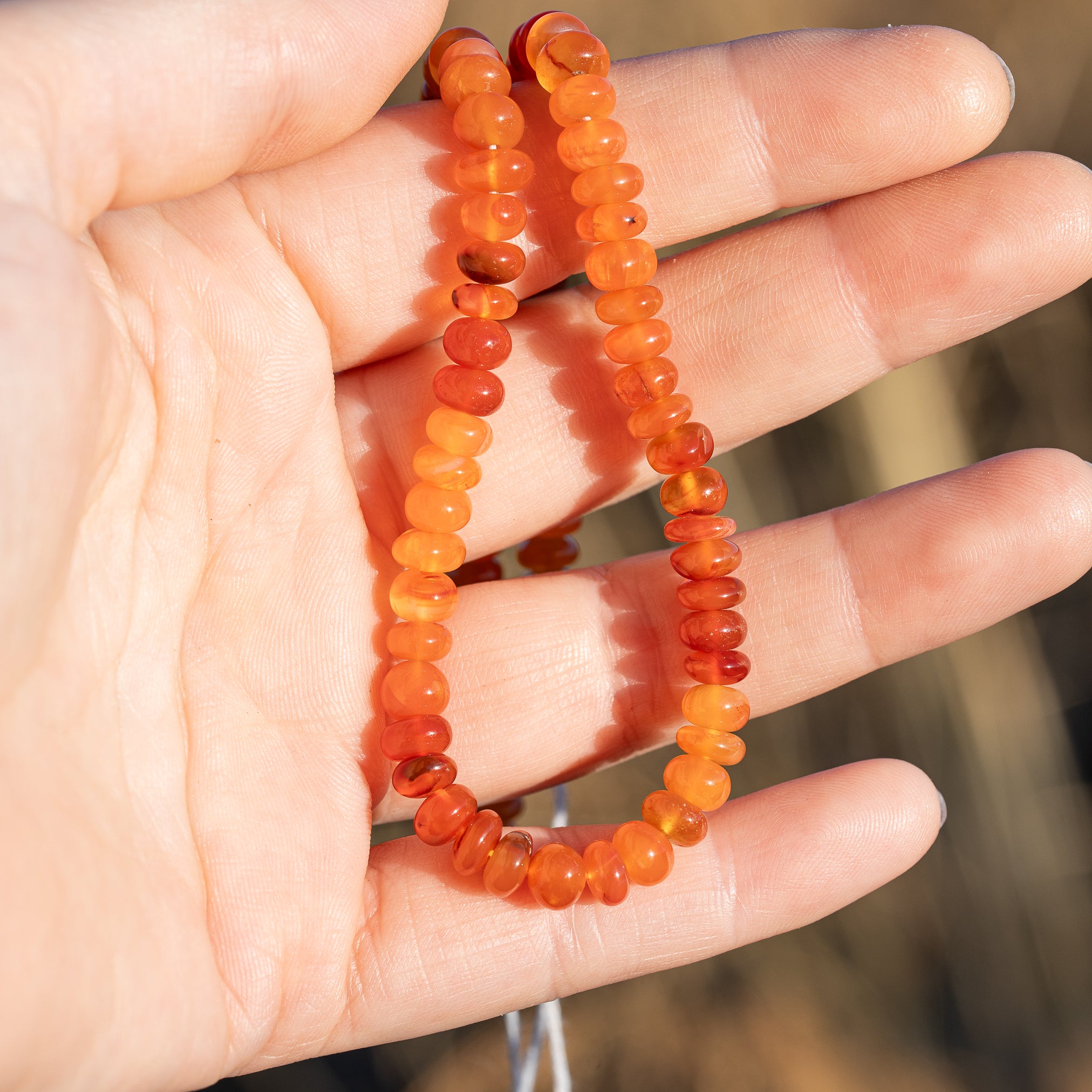 Fil de 33 cm de perles rondelles lisses de Cornaline de env 6/6,5 x 3/5 mm