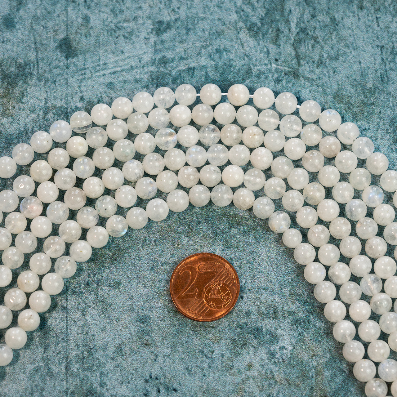 Perles rondes lisses de Labradorite blanche de 6 mm ( rang de env 60 perles )