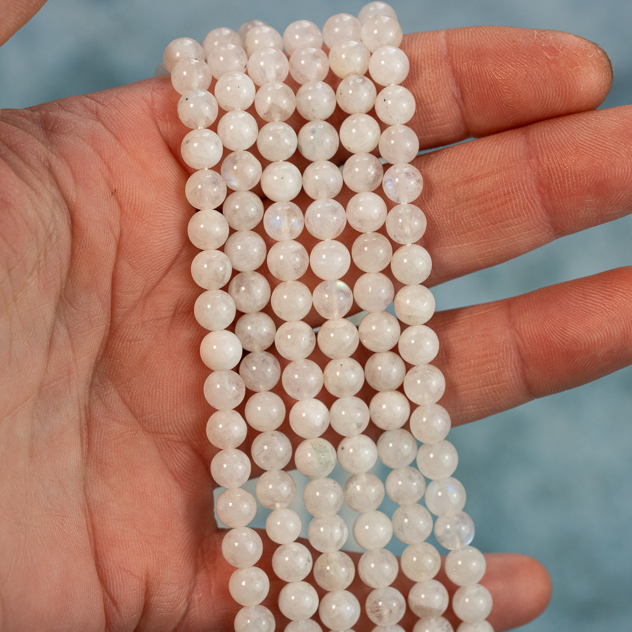 Perles rondes lisses de Labradorite blanche de 6 mm ( rang de env 60 perles )