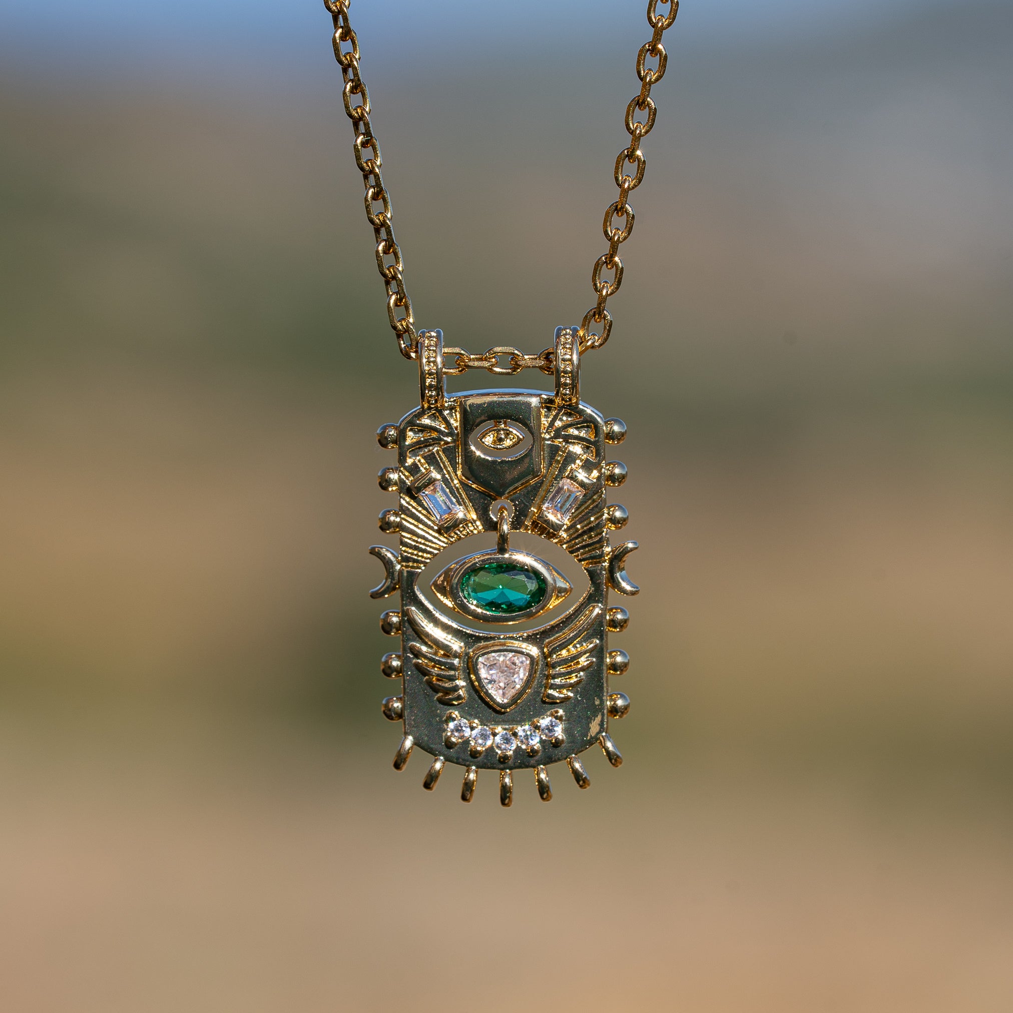 Breloques rectangle/oeil articulées en laiton plaqué or 18k et zirconium de 28 mm ( à l&