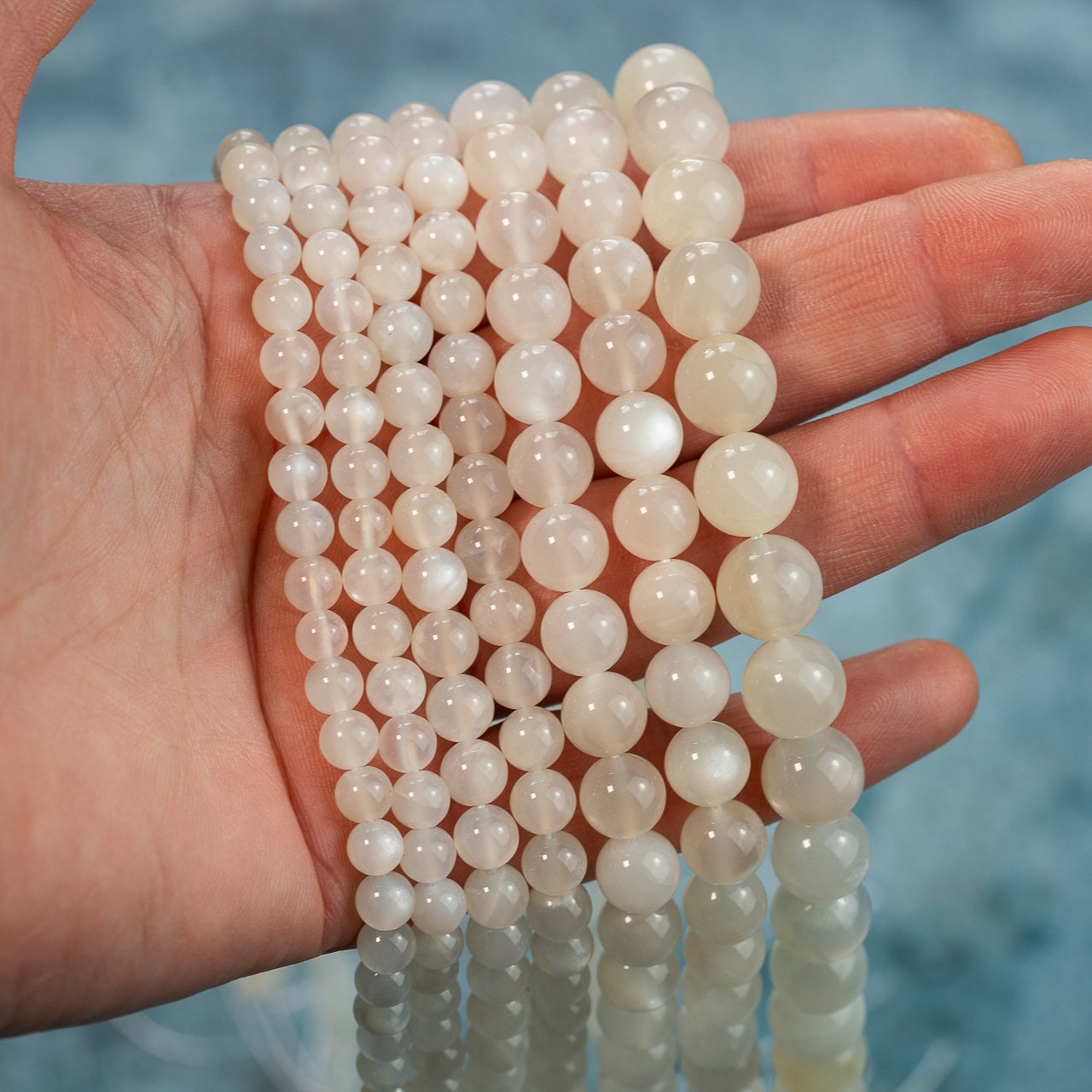 Perles rondes lisses de Pierre de lune blanche de 5,5 à 10 mm au choix ( Rang, 1/2 rang ou lot )