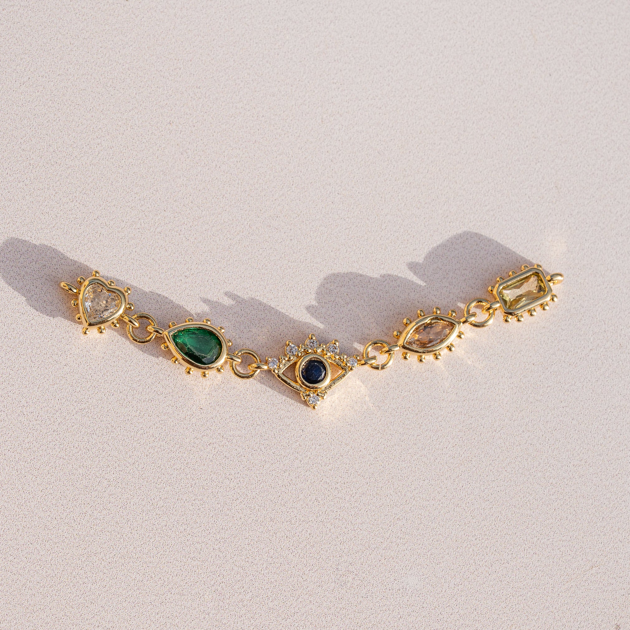 Breloque connecteur oeil/coeur/goutte en laiton plaqué or 18k et zirconium colorés de 58 mm ( à l&