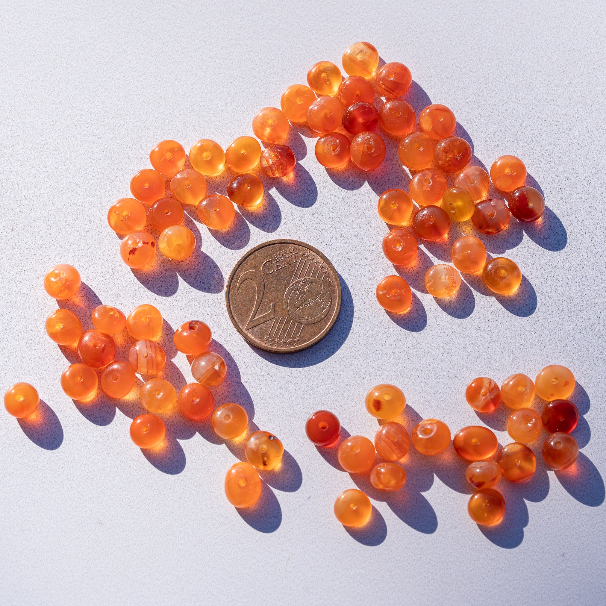 Perles rondelles lisses de Cornaline de env 5,5 mm ( lot de 4 perles )