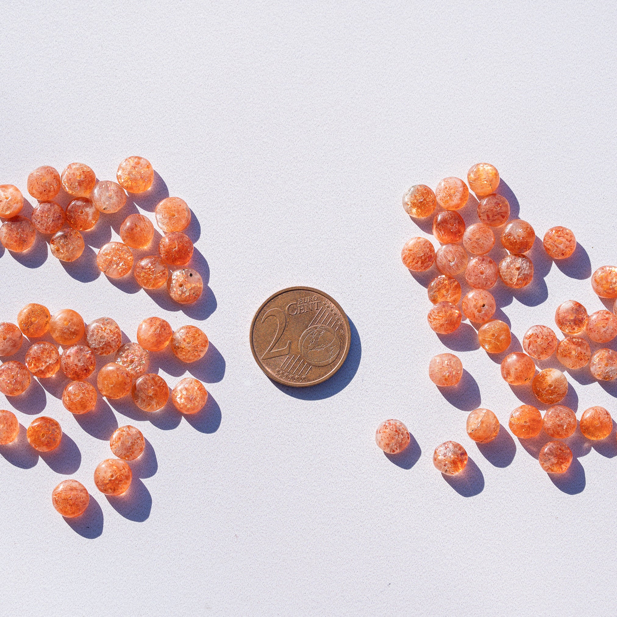 Perles rondelles lisses de Pierre de soleil de 6 à 6,5 mm au choix ( lot de 4 perles )