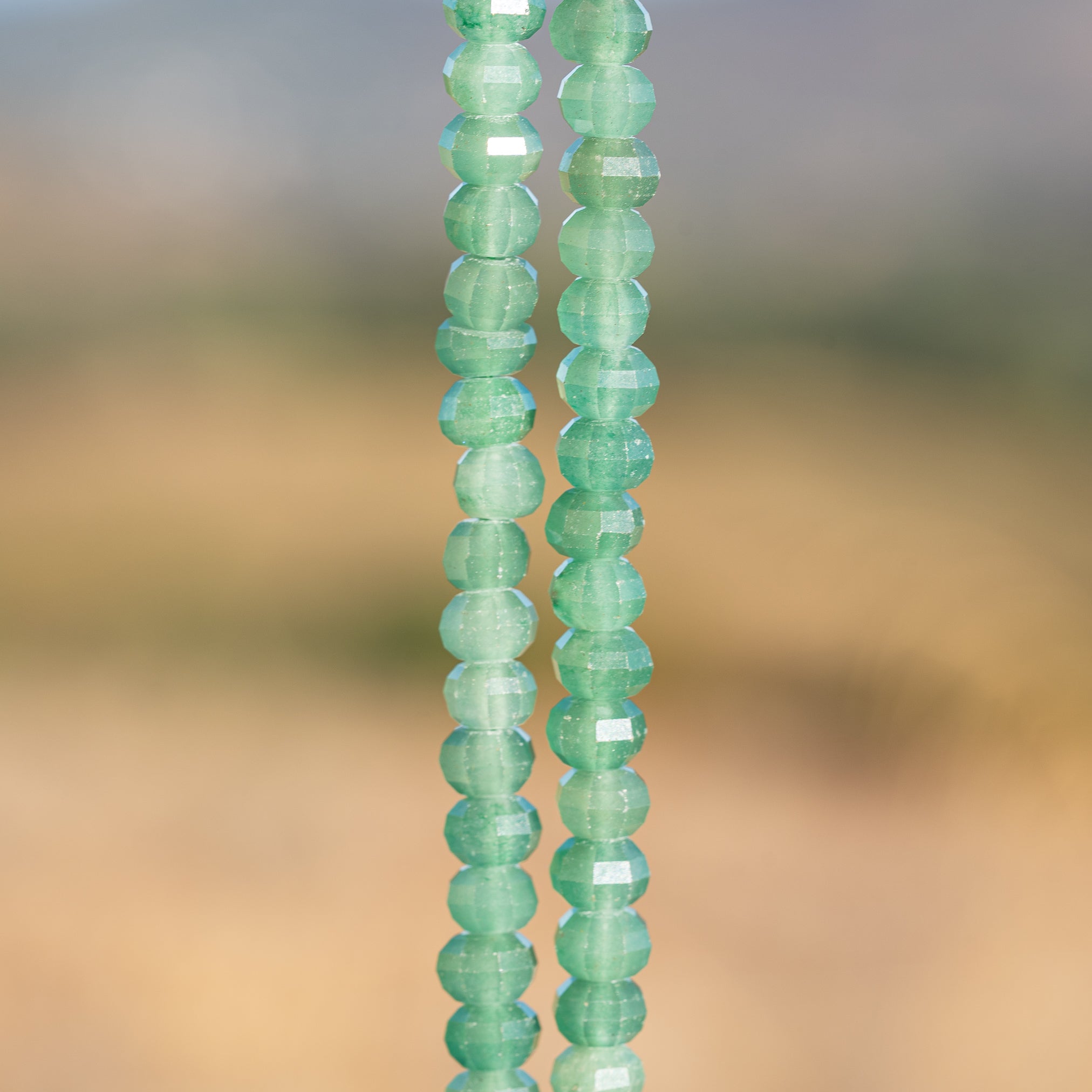 Perles rondelles facettes lanternes/citrouilles en Aventurine de 8 x 5 mm ( 1/2 rang de env 34 perles )