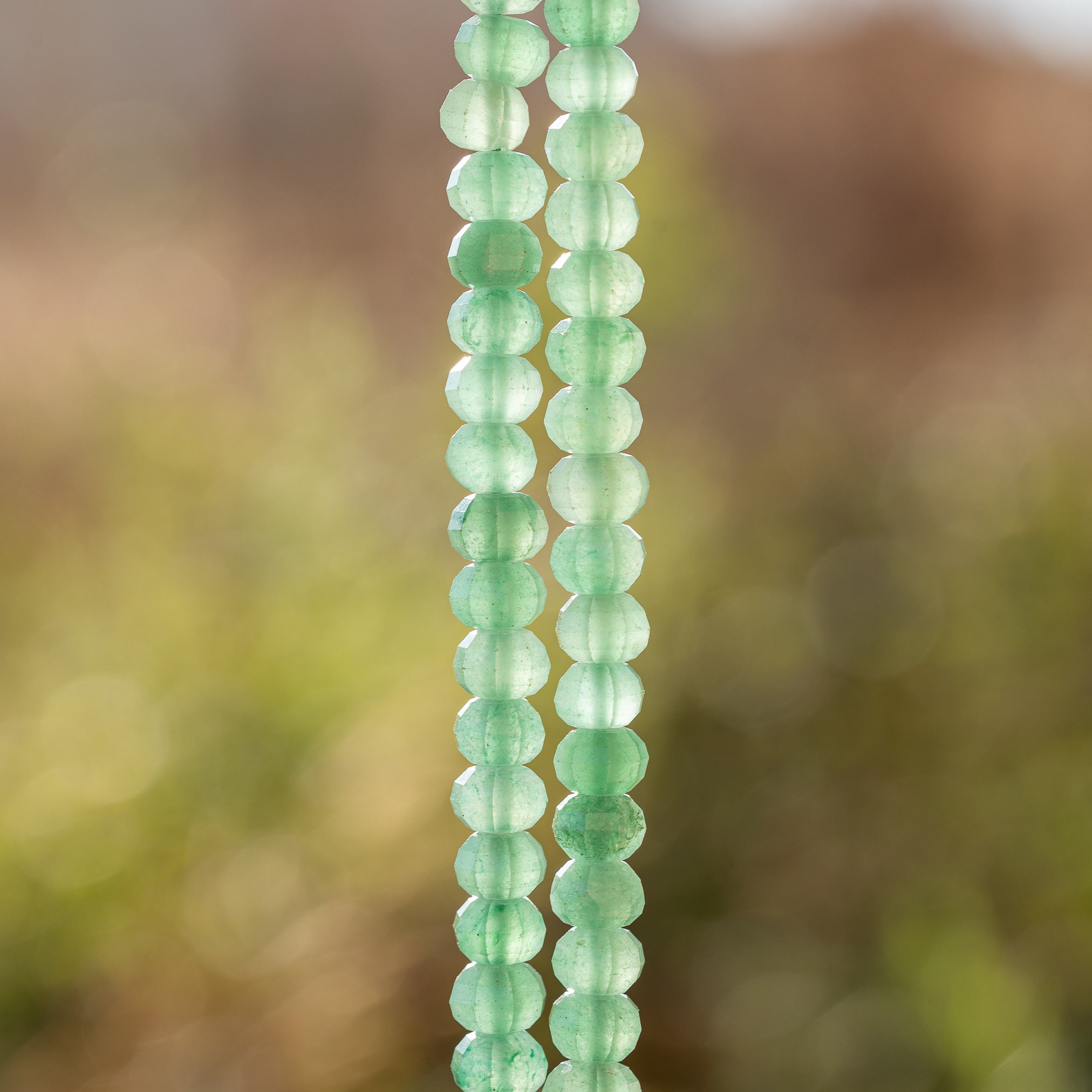 Perles rondelles facettes lanternes/citrouilles en Aventurine de 8 x 5 mm ( 1/2 rang de env 34 perles )