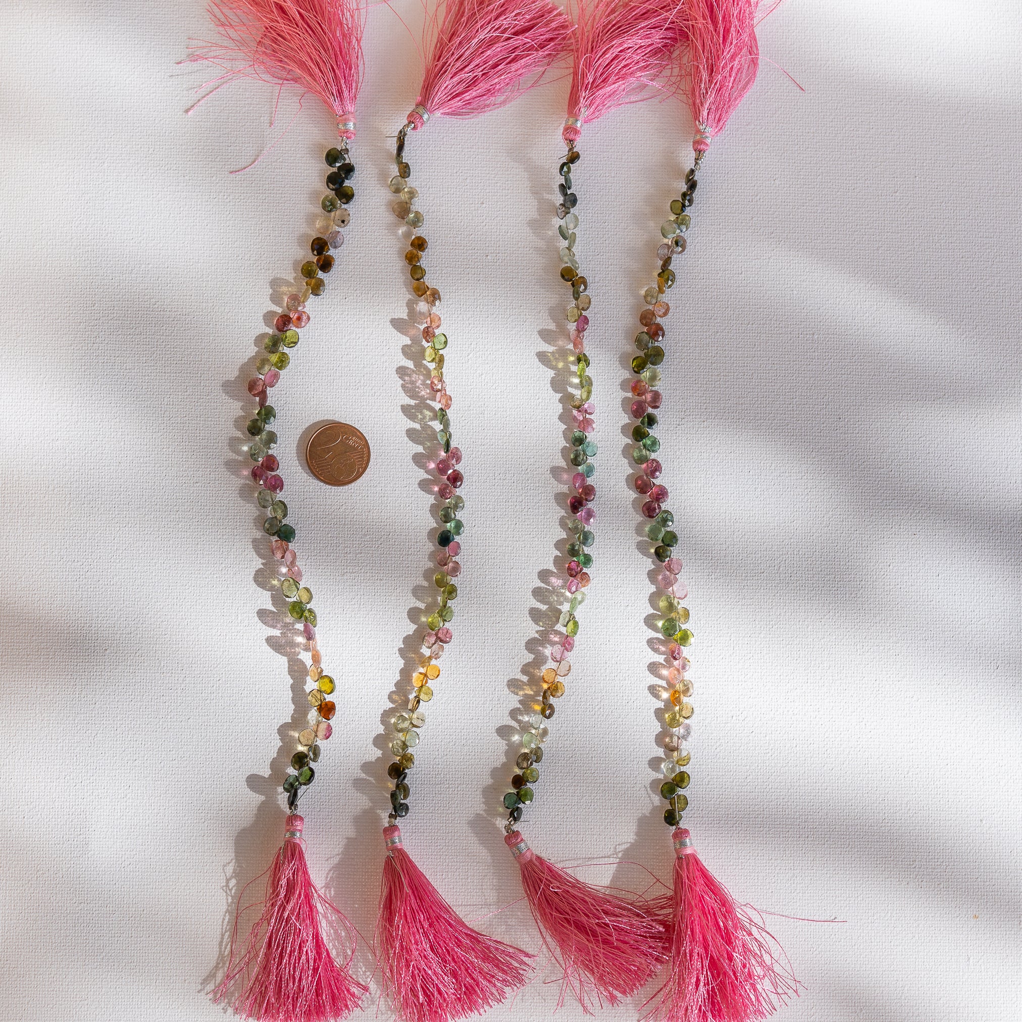 Fil de 20 cm et env 56/62 perles gouttes facettes de Tourmaline multicolore de env 4/6 mm
