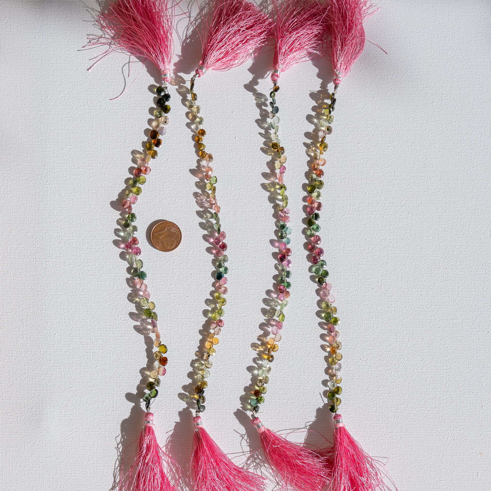 Fil de 20 cm et env 56/62 perles gouttes facettes de Tourmaline multicolore de env 4/6 mm