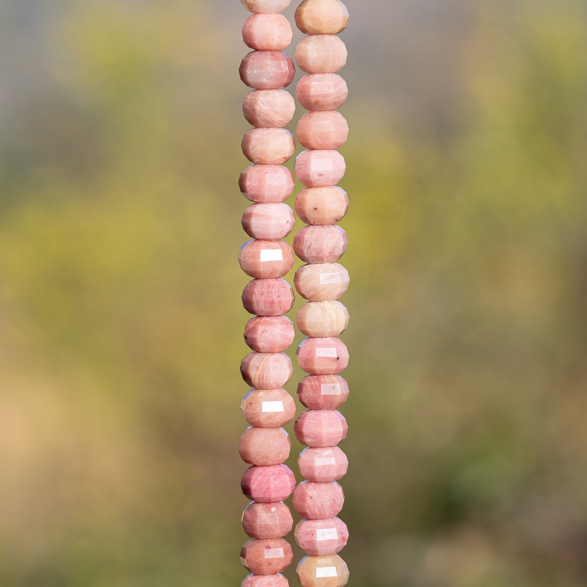 Perles rondelles facettes lanternes/citrouilles de Rhodonite de 8 x 5 mm ( 1/2 rang de env 34 perles )