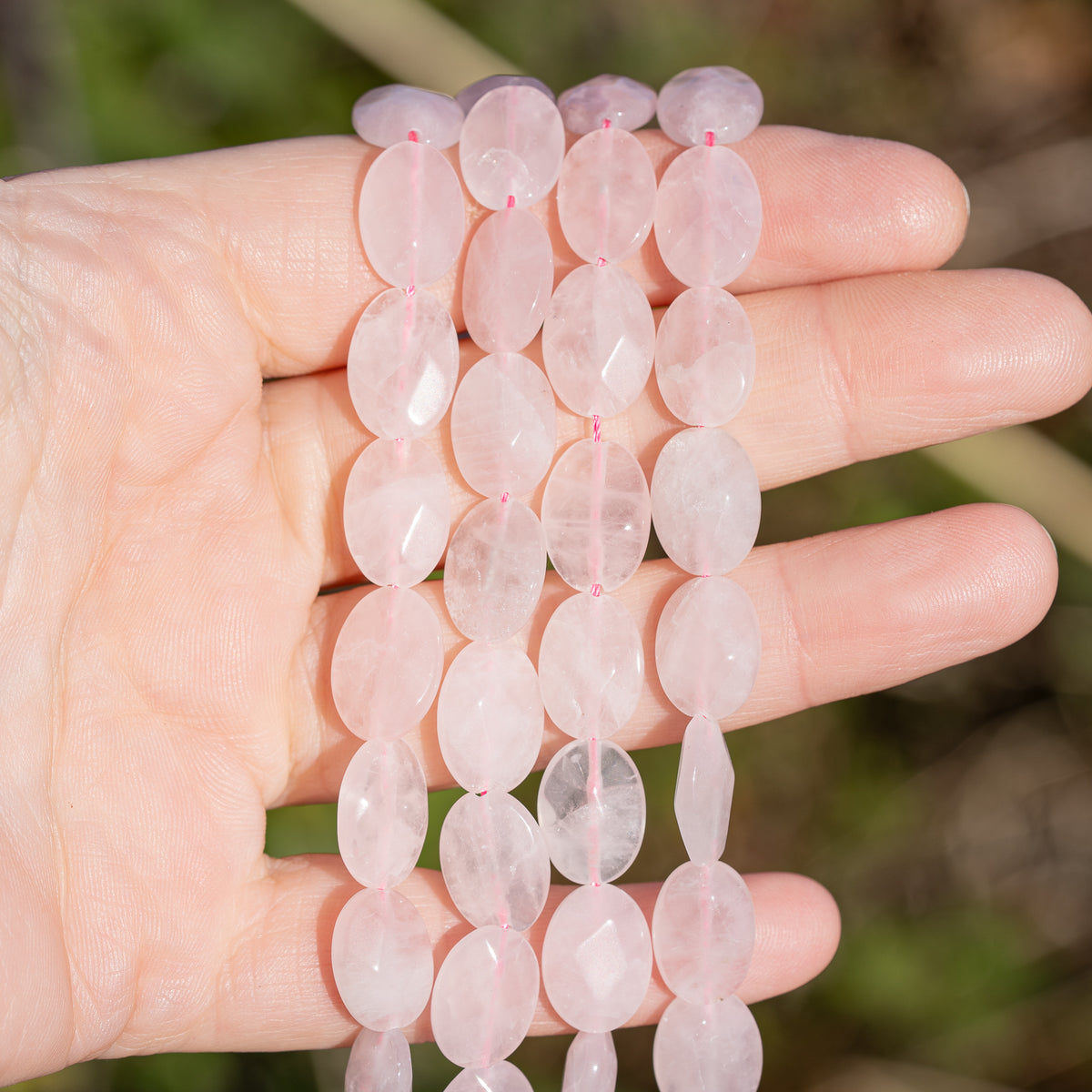 Perles ovales facettes de Quartz rose de env 13/14 mm ( lot de 2 )