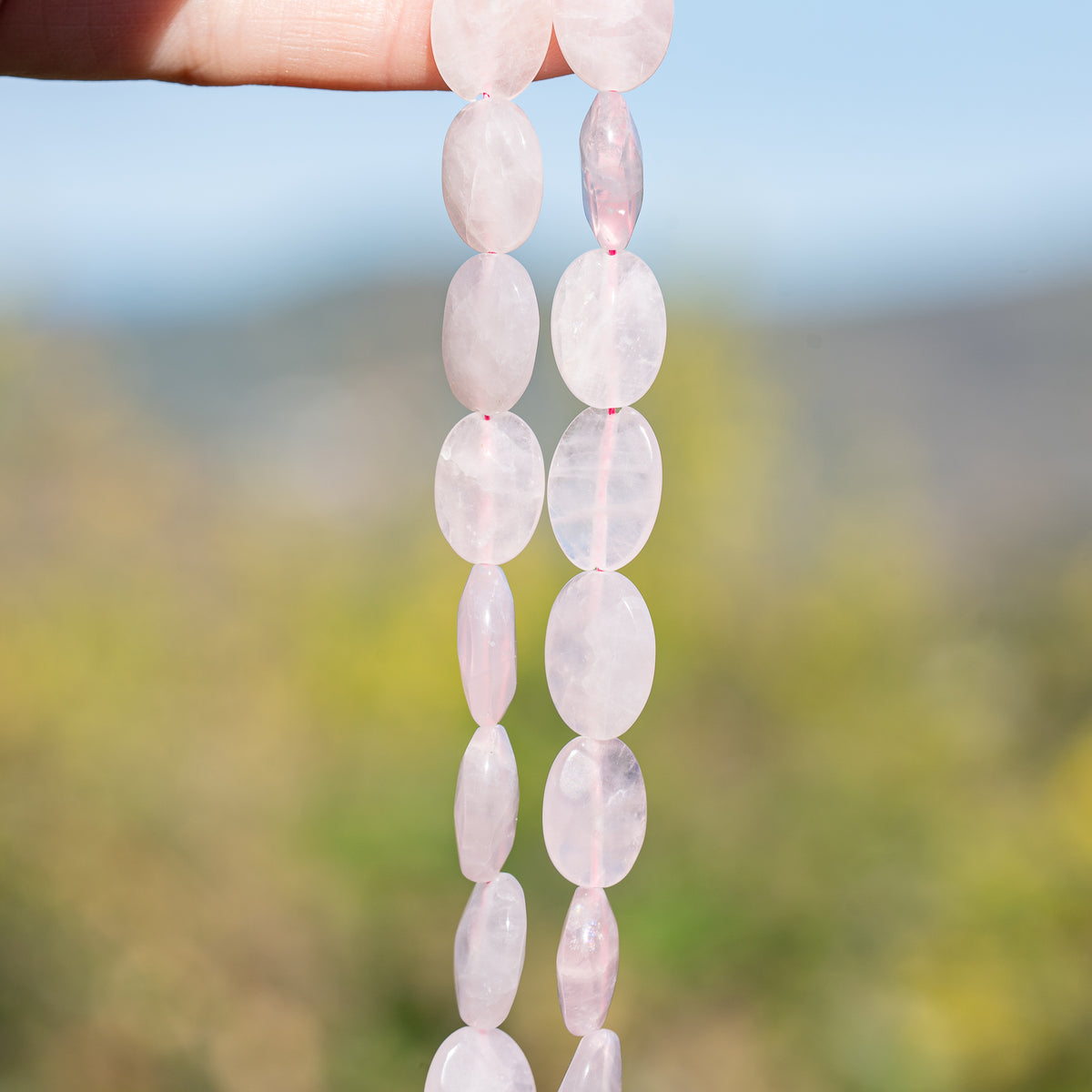 Perles ovales facettes de Quartz rose de env 13/14 mm ( lot de 2 )