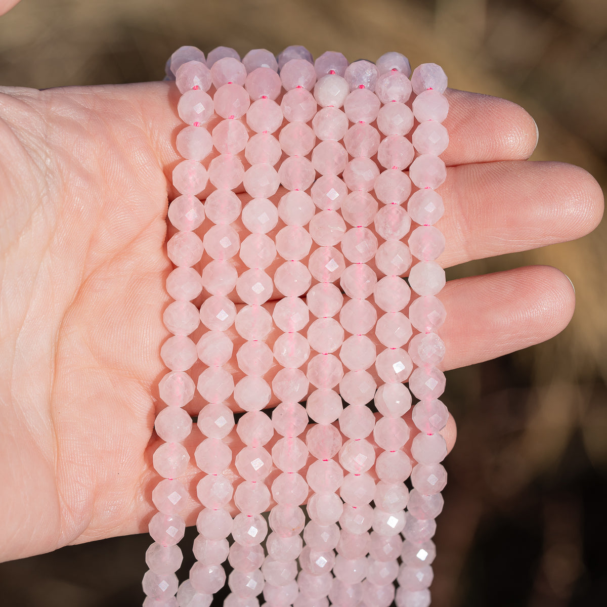 Perles rondes facettes de Quartz rose de 6 mm ( rang de env 62 perles )